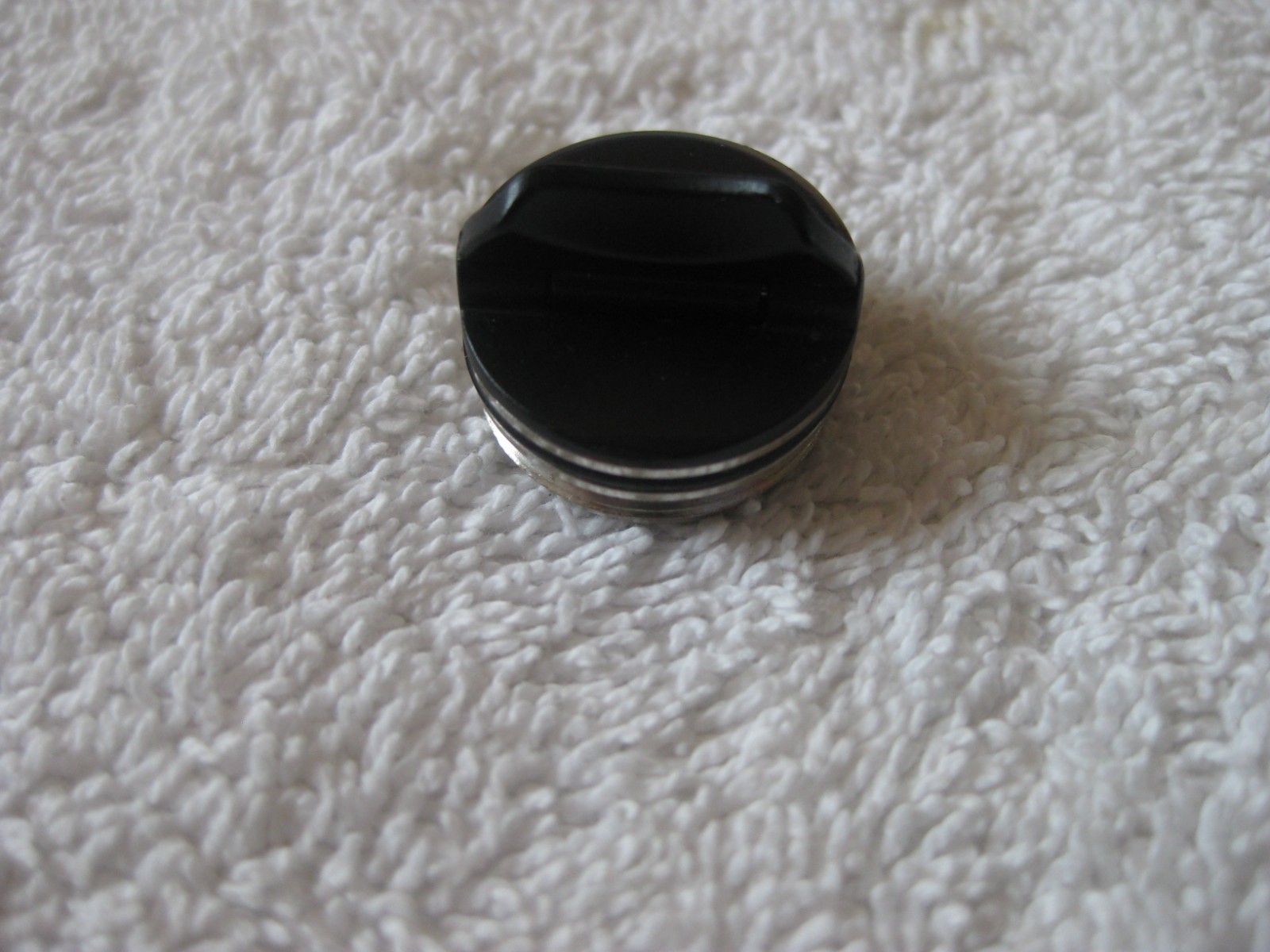 Bushnell Pro X7 or Pro 1M RANGEFINDER BATTERY CAP
