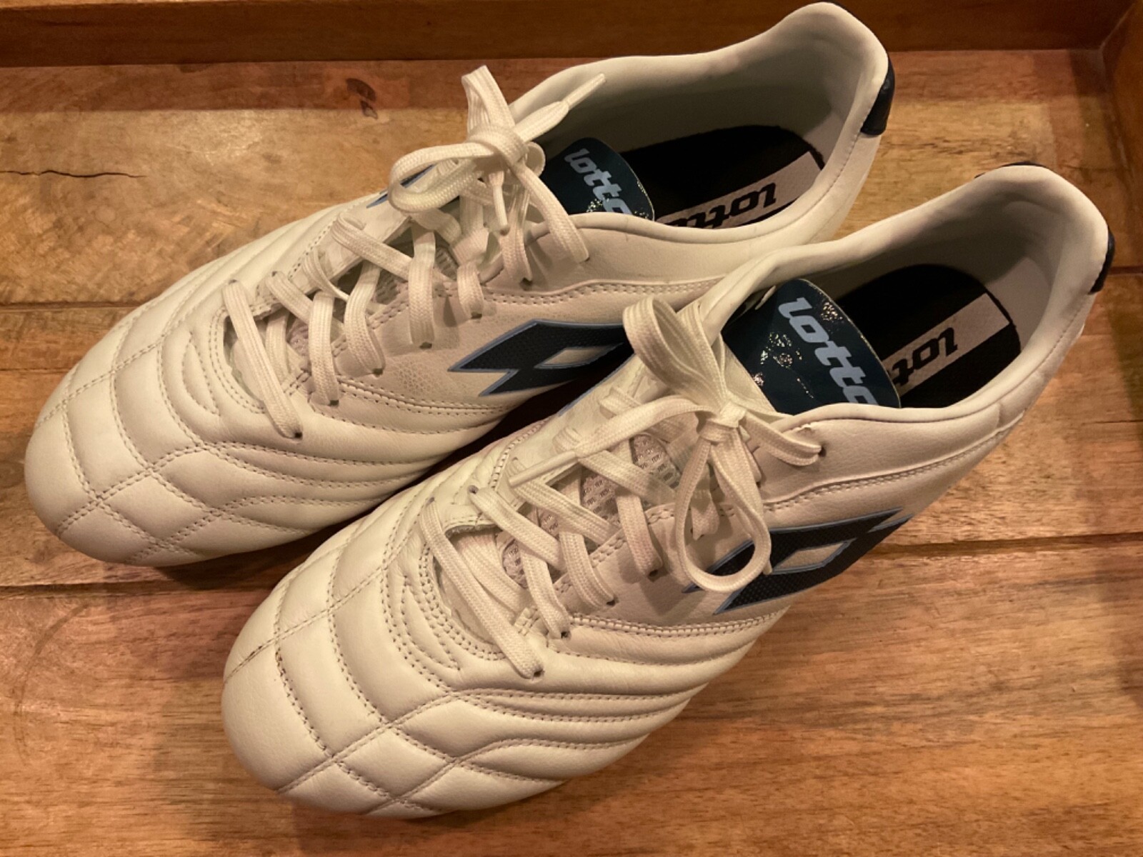 LOTTO STADIO 300 III 214602 FG CLEATS ( MENS 12 ) WHITE BLUE VGC
