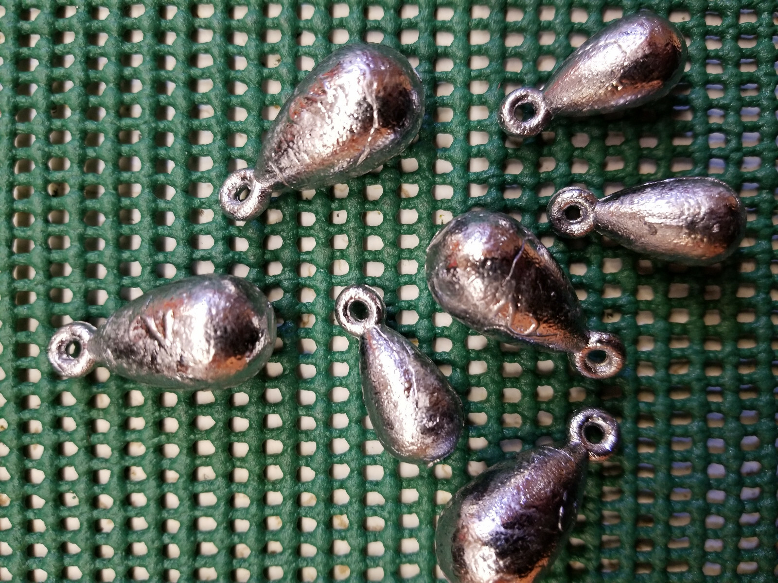 25 Lead 2 oz Bell Sinkers with cast eyes. Free shipping