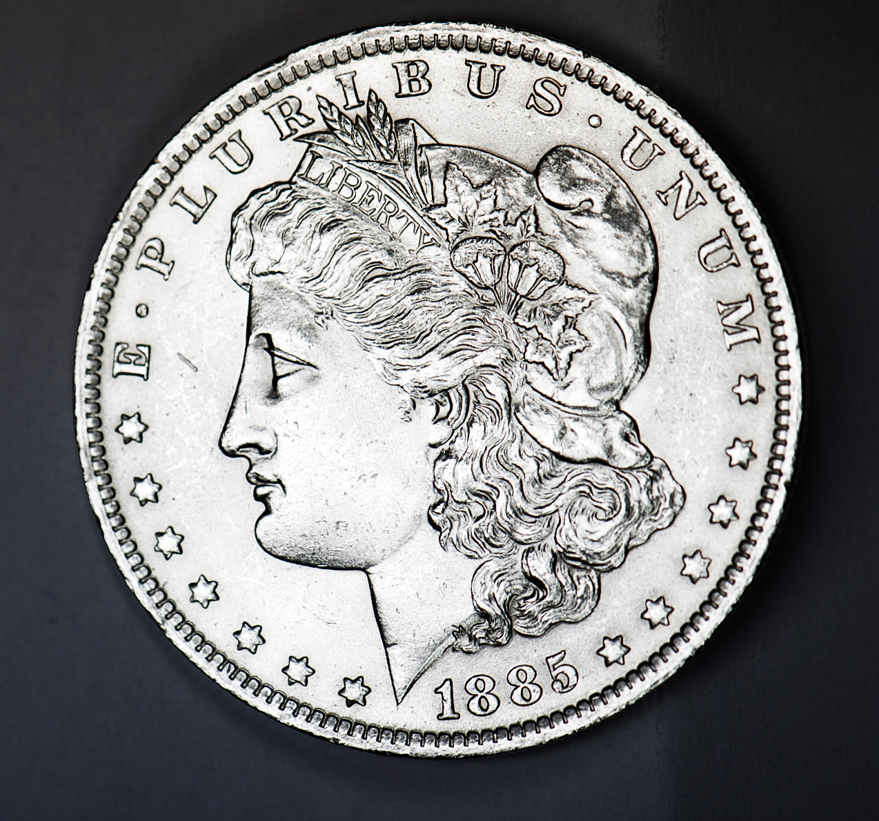 1885-o Morgan Silver Dollar. Full Chest Feathers.   BU.  (Inventory A)
