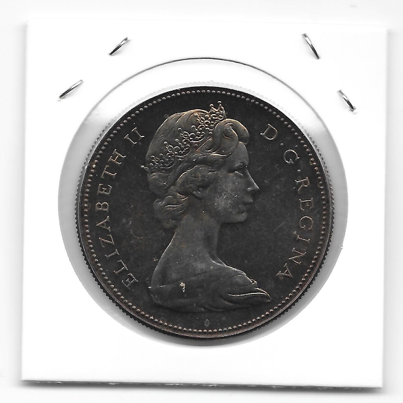 1967 CANADIAN SILVER DOLLAR BEAUTIFUL TONING (VERY NICE)