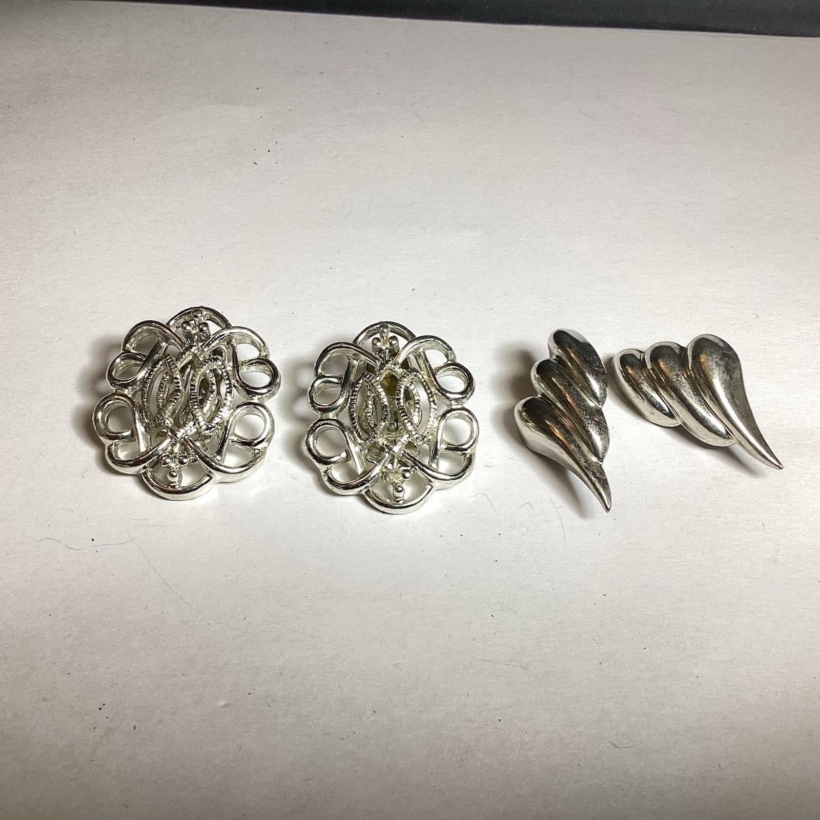 TWO PAIR MIXED LOT OF CLIP-ON EARRINGS SILVERTONE FILIGREE & MODERNIST DESIGNS