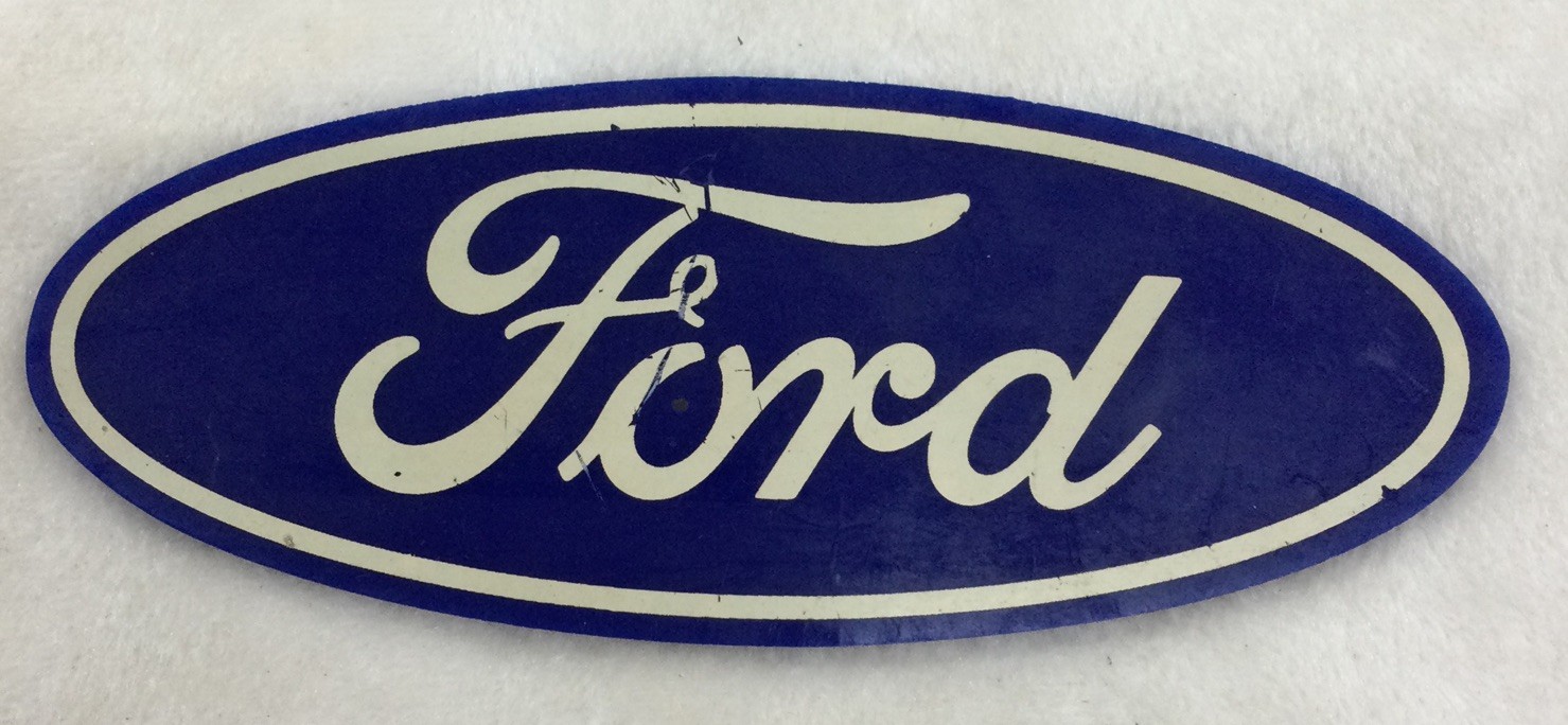 Ford Oval Embossed 7.375” X 2.875”, Preowned Condition.
