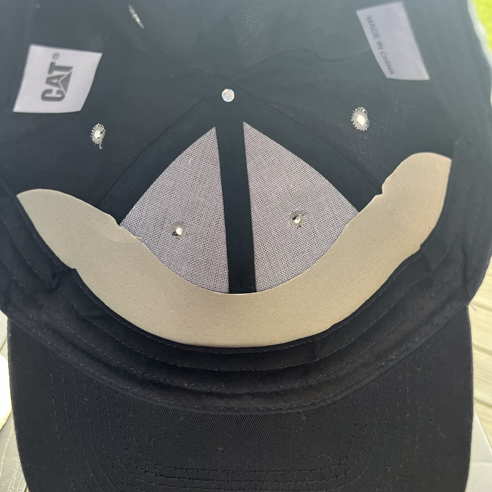 CAT w Logo Silver on Black Hat Cap Hook Loop Gray Bill Edge Cardboard in front