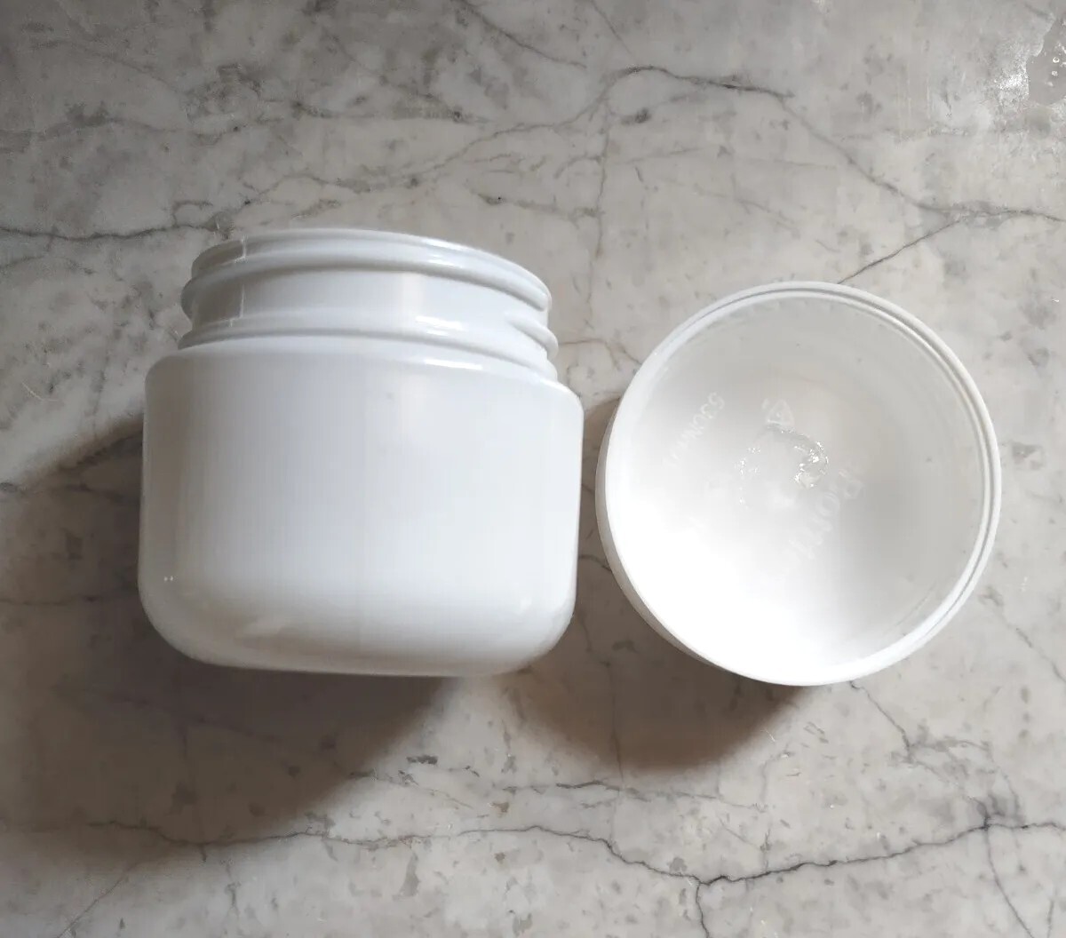 Lot of 20 plastic containers 2.5" x 2.5" with screw on lids white in color