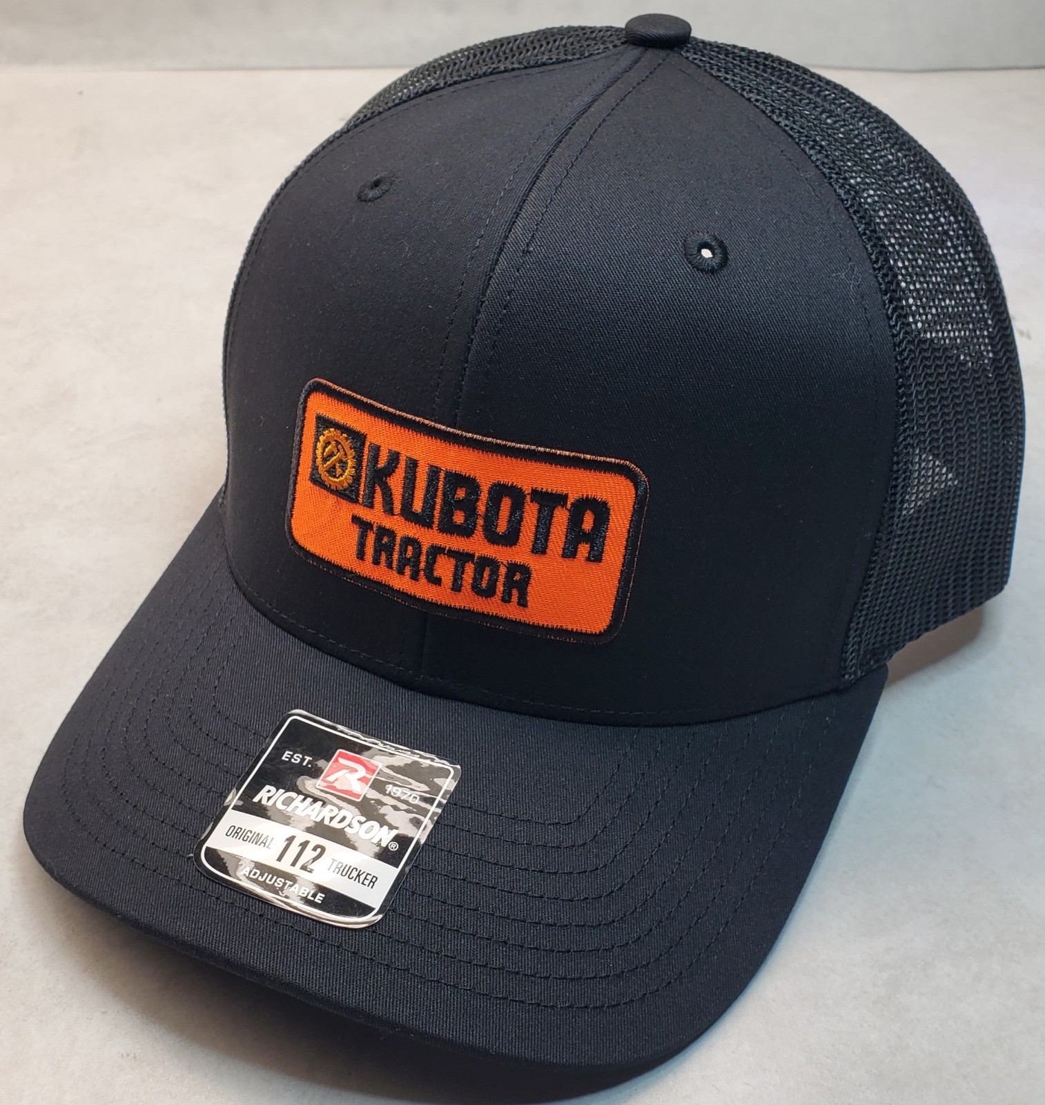 Kubota Tractor Emb. Patch on  Richardson 112 Trucker Hat Snapback Black/Black