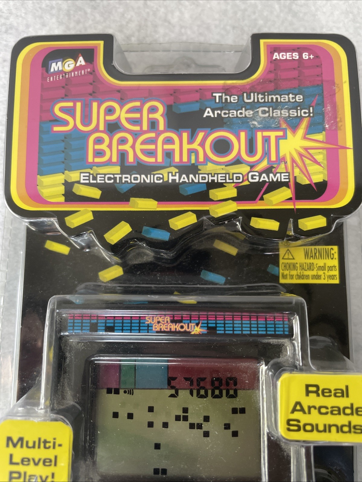 Super Breakout Electronic Handheld Game by MGA Entertainment