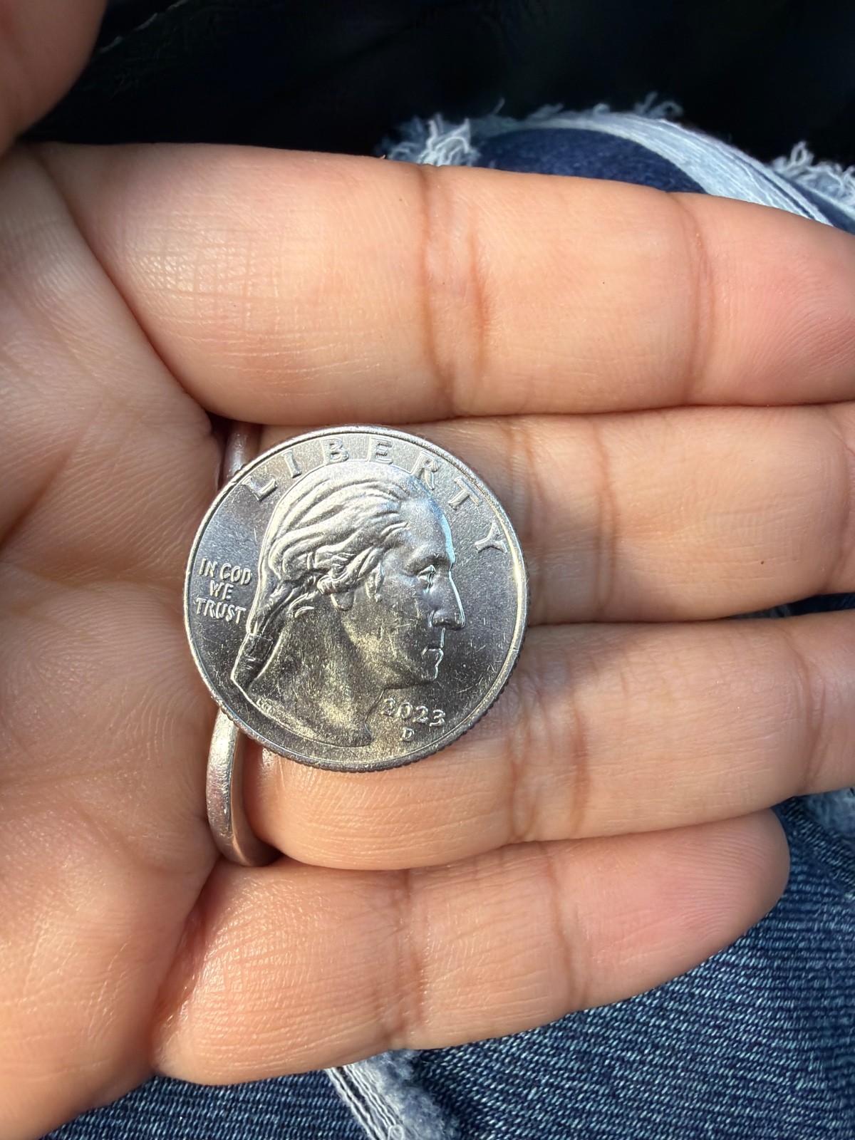 ERROR 2023 P - Jovita Idar Quarter  Reads “In Cod We Trust”