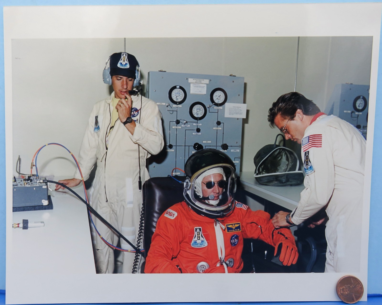 NASA press PHOTO STS-43 Space Shuttle ATLANTIS Pilot Michael BAKER Suiting Up