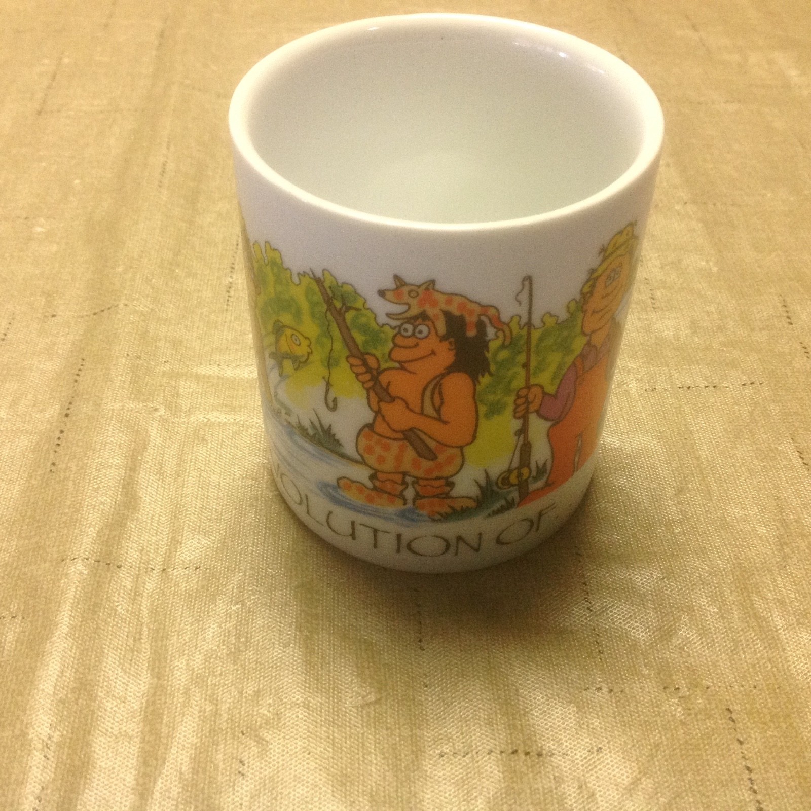The Evolution Of Fishing Coffee Mug