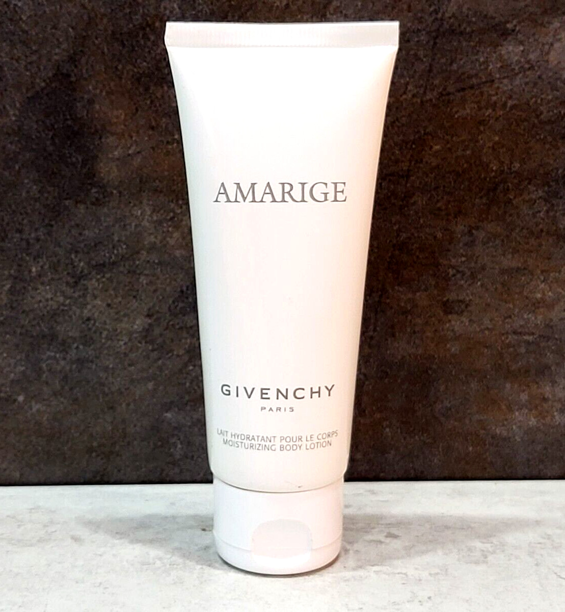 Givenchy ~ Amarige ~ 2.5 oz moisturizing body lotion, 75 ml