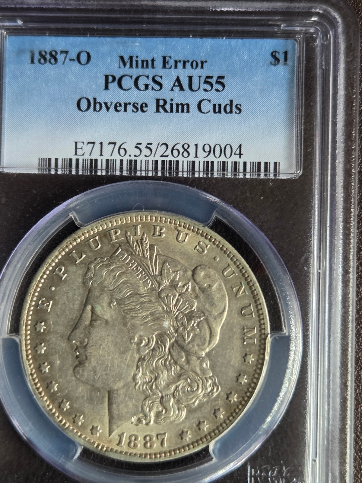 1887 O Morgan Silver Dollar Mint Error Obverse Rim Cuds PCGS AU55