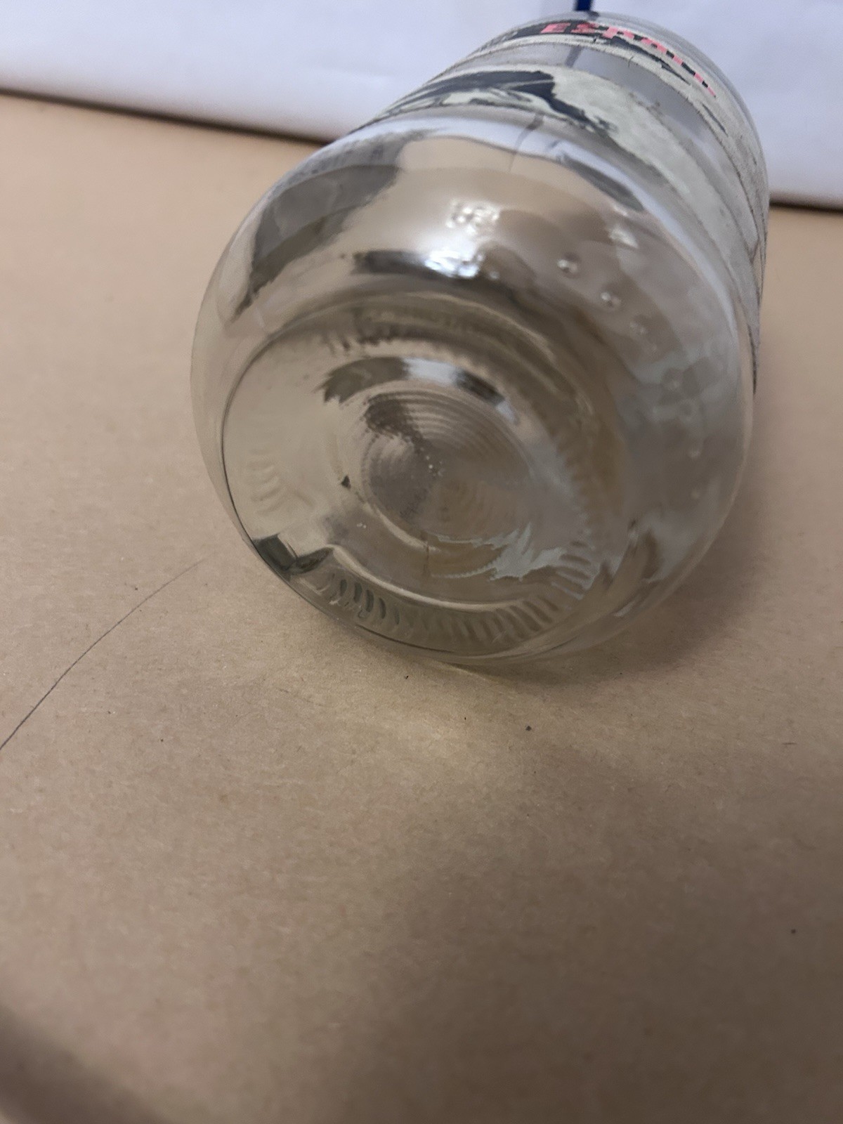 Thick Glass unbranded bottle with cork top likely tequila
