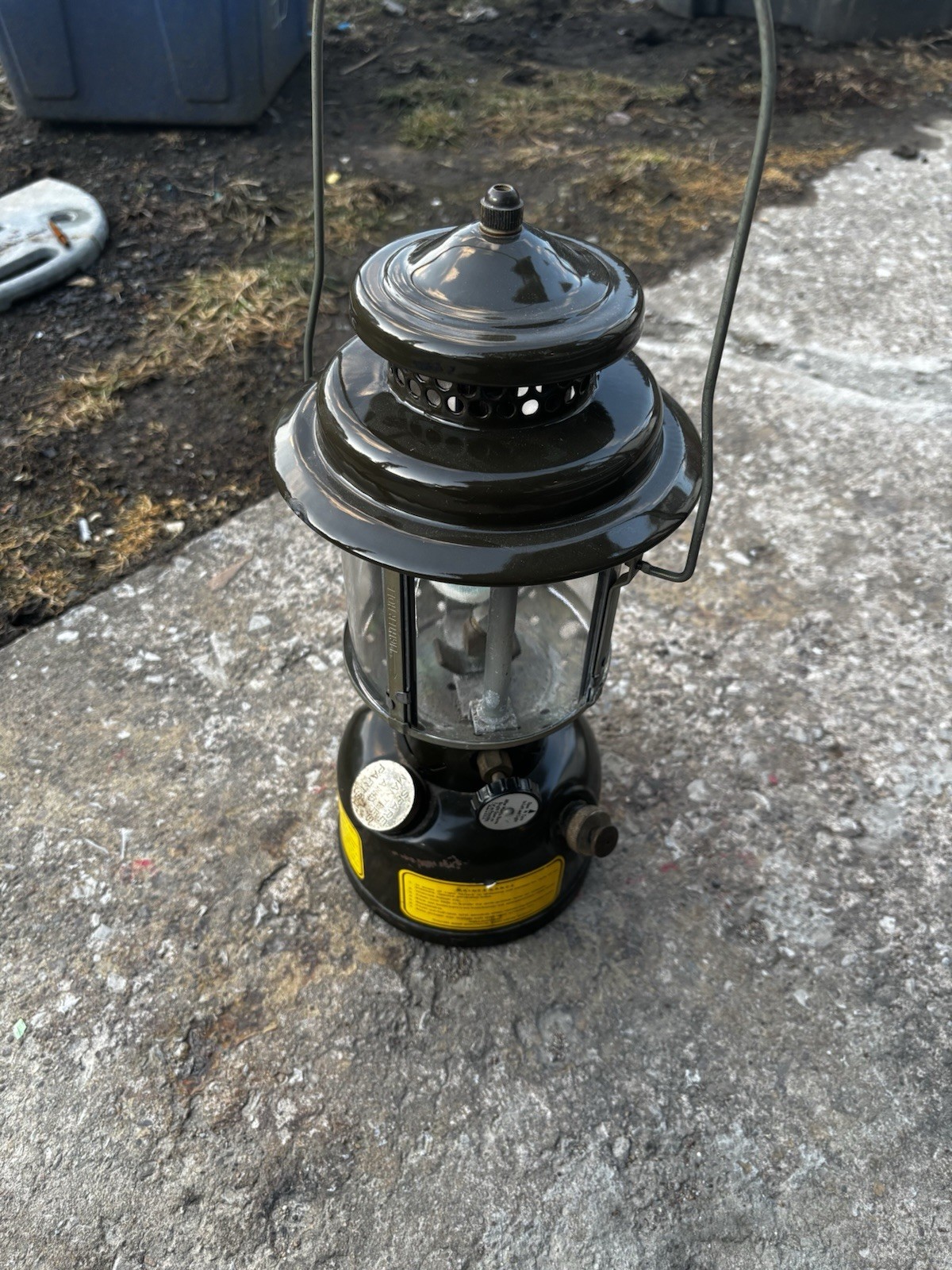 This item is a vintage Coleman Military Style gasoline lantern, commonly known