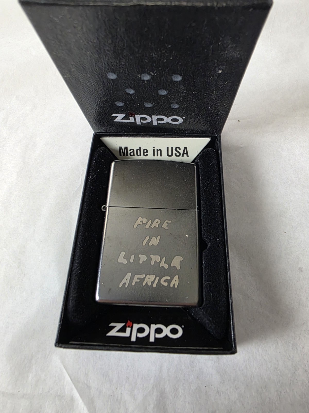 Fire In Little Africa Zippo Lighter Unfired