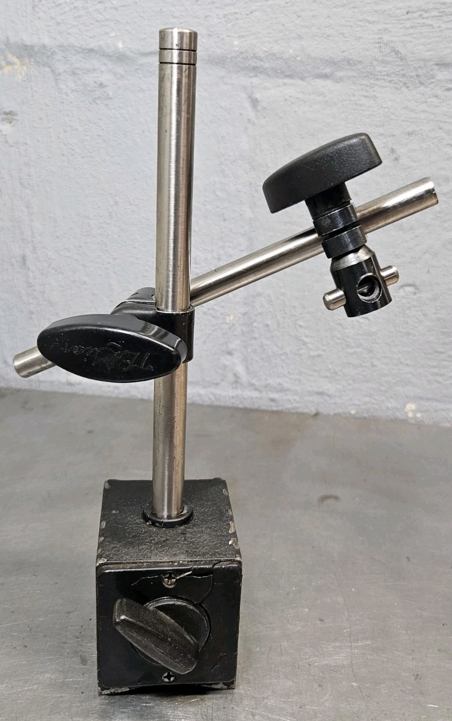 Starrett No. 196 dial indicator with a ??? magnetic base
