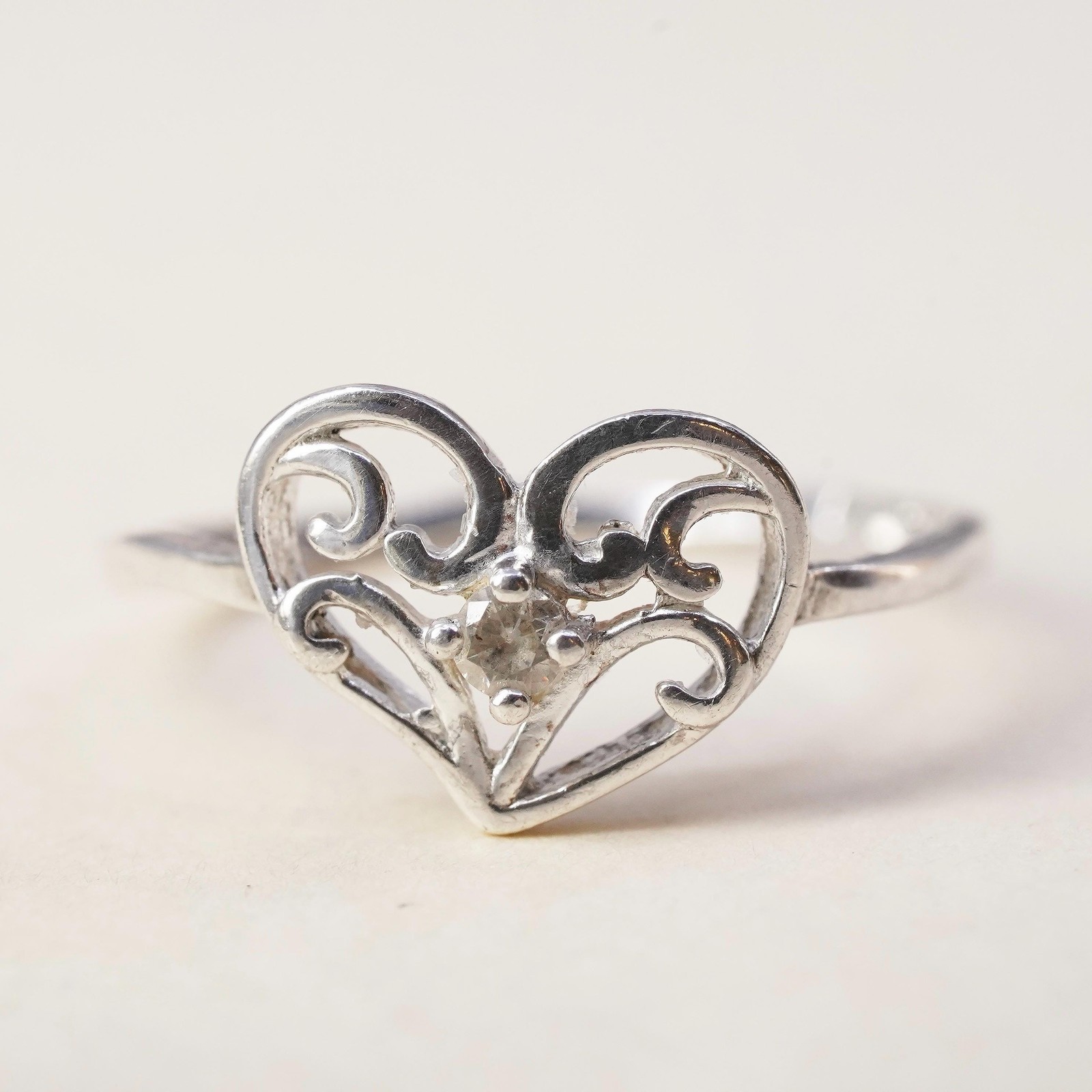 Size 7.25, Vintage sterling silver handmade ring, swirly heart ring with cz