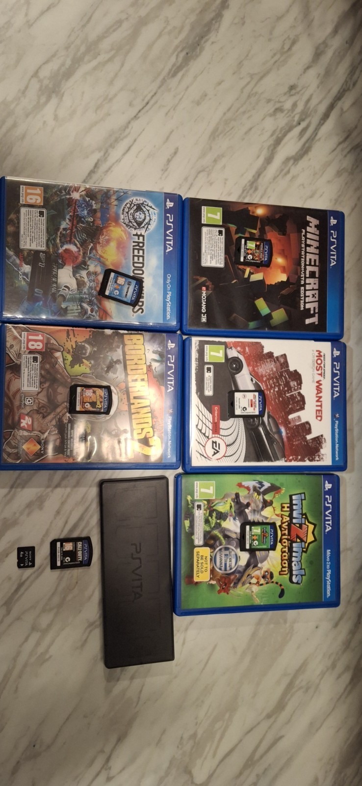 Psvita Game Bundle, And A 4 Gb Memory Card + Game case.