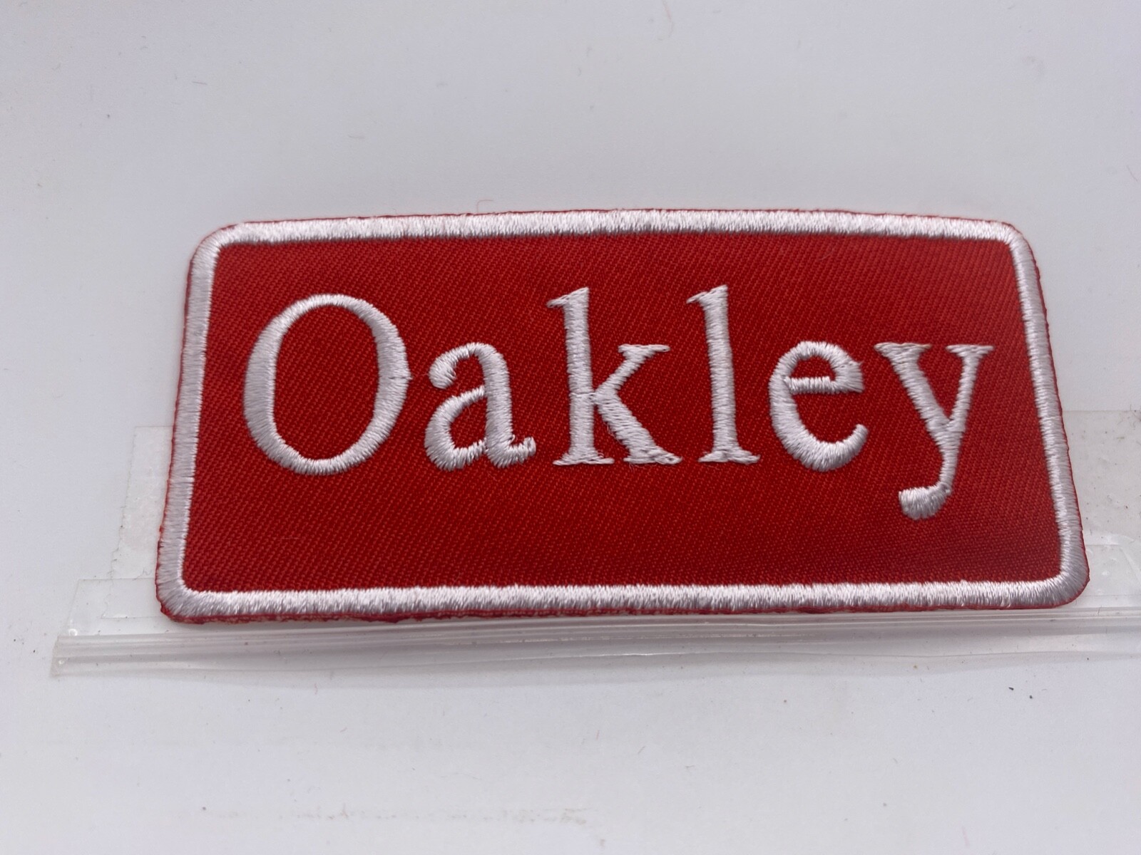 OAKLEY  NEW EMBROIDERED  SEW / IRON ON NAME PATCH ASSORTED COLORS