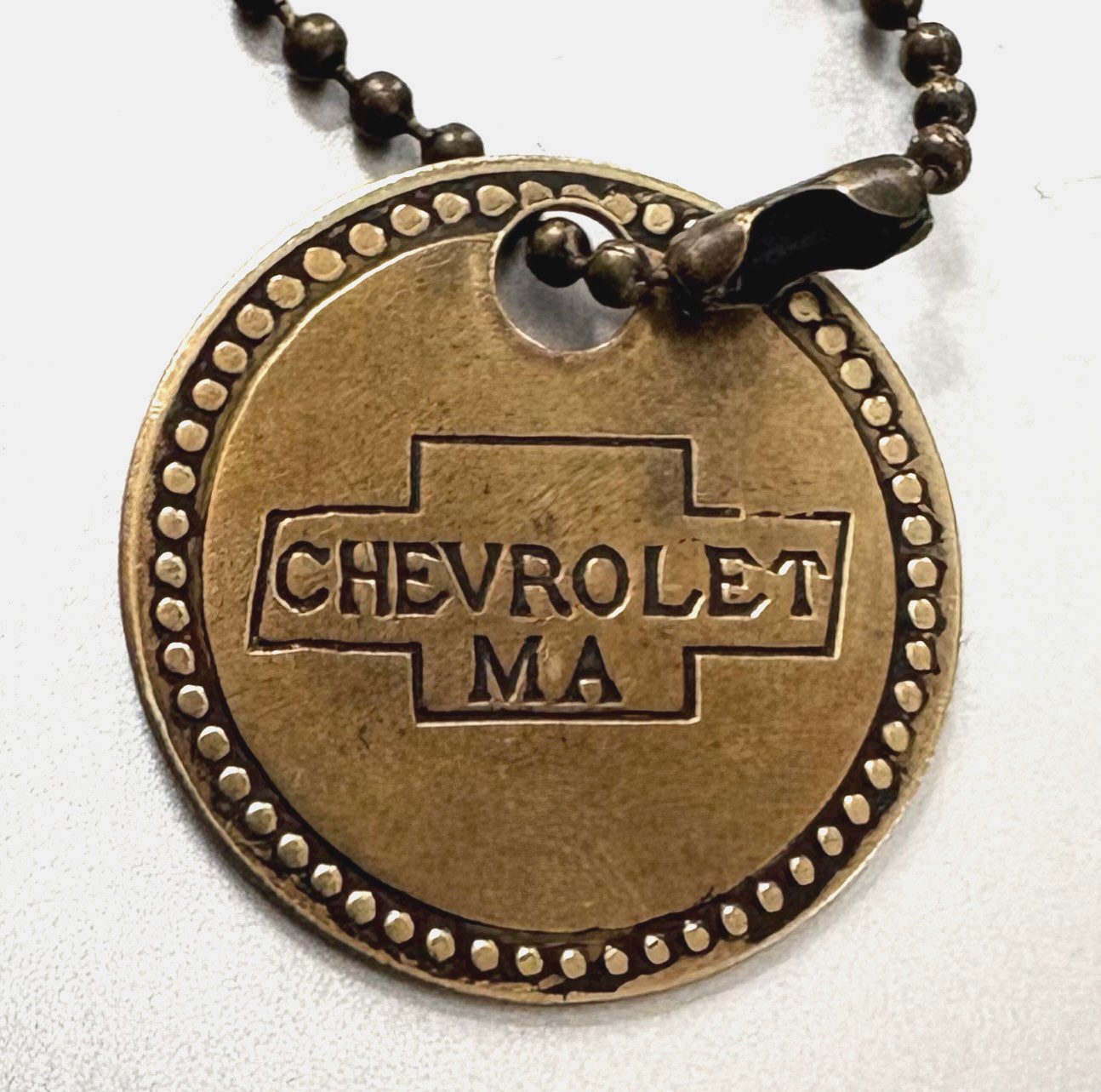 Vtg CHEVROLET FLINT MFG ASSEMBLY TOOL CHECK BRASS TAG; Bow-Tie Emblem;  Keychain