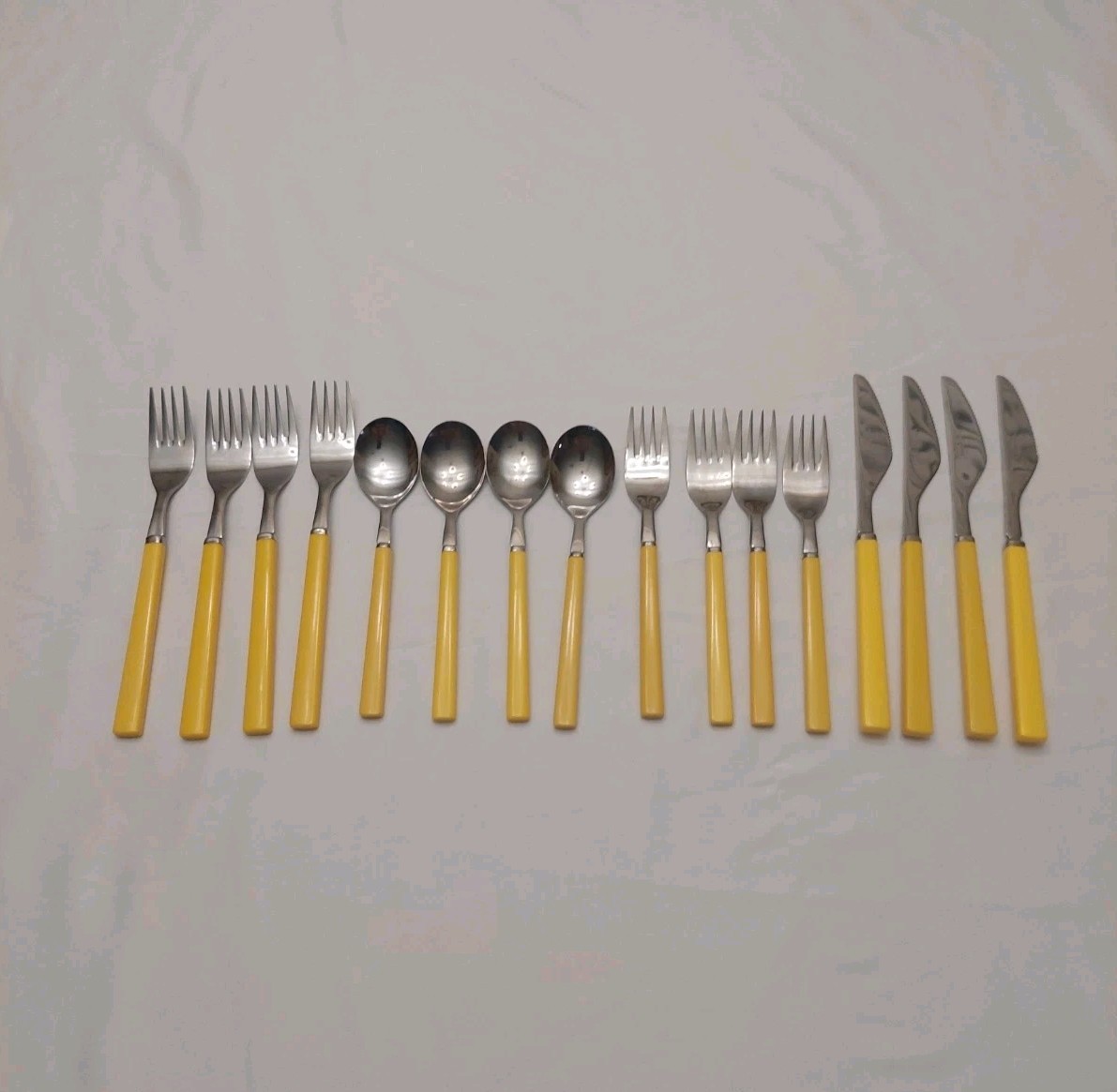 Vintage 16 Piece Anacapa Yellow Melamine Handle Stainless Flatware