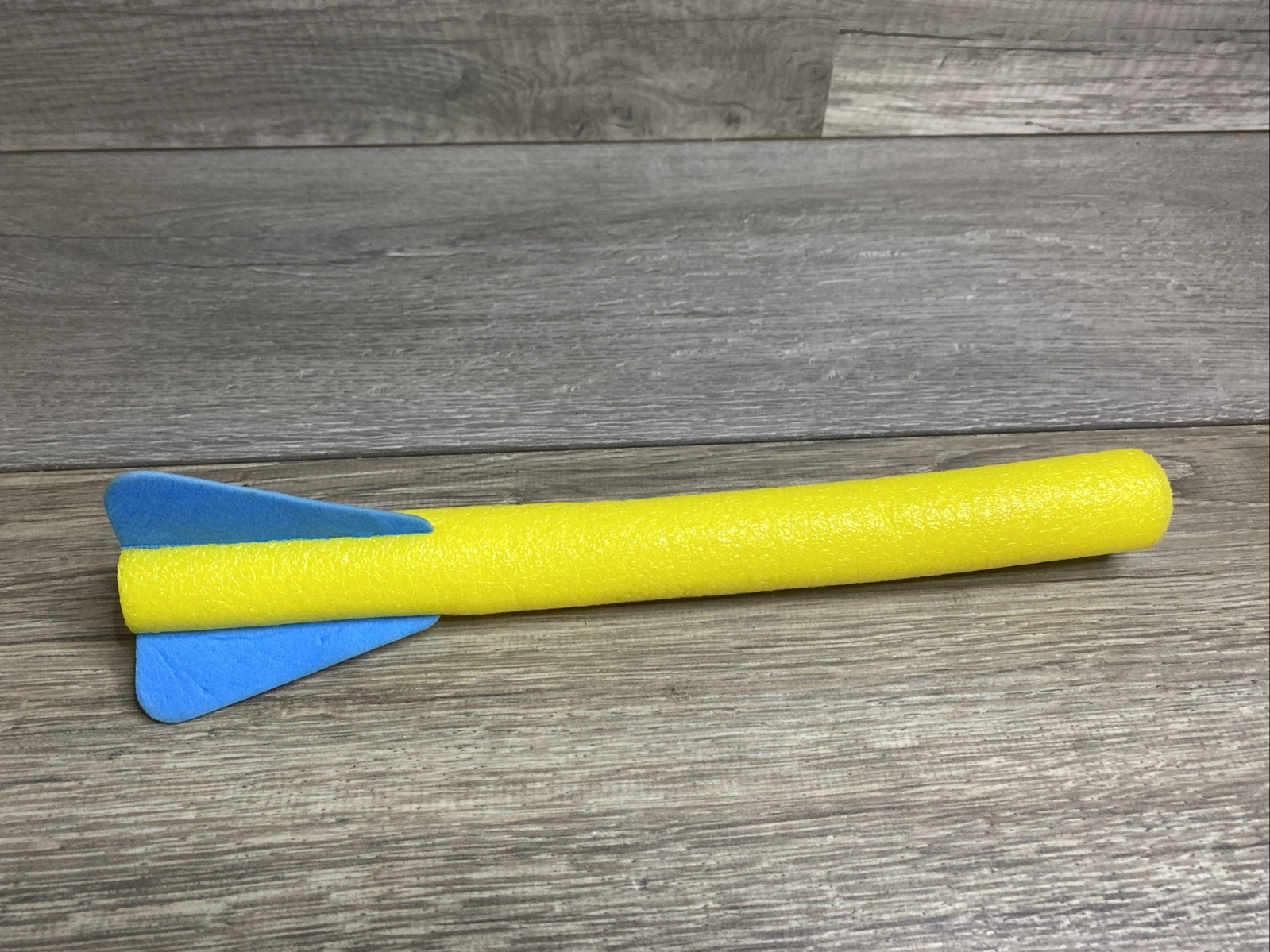 Yellow and Blue Soft Foam Rocket Toy with Fins for Outdoor Launching Games