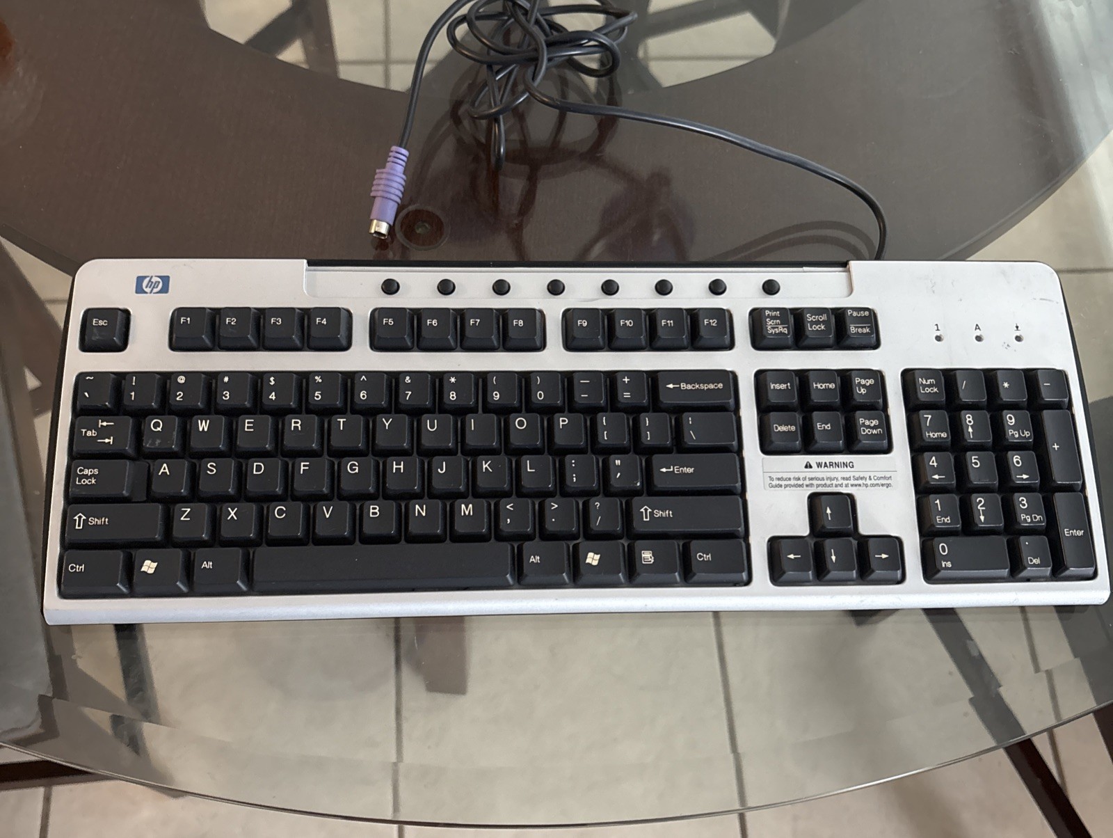 HP BLACK AND SILVER , PS/2 KEYBOARD CLEANED AND TESTED