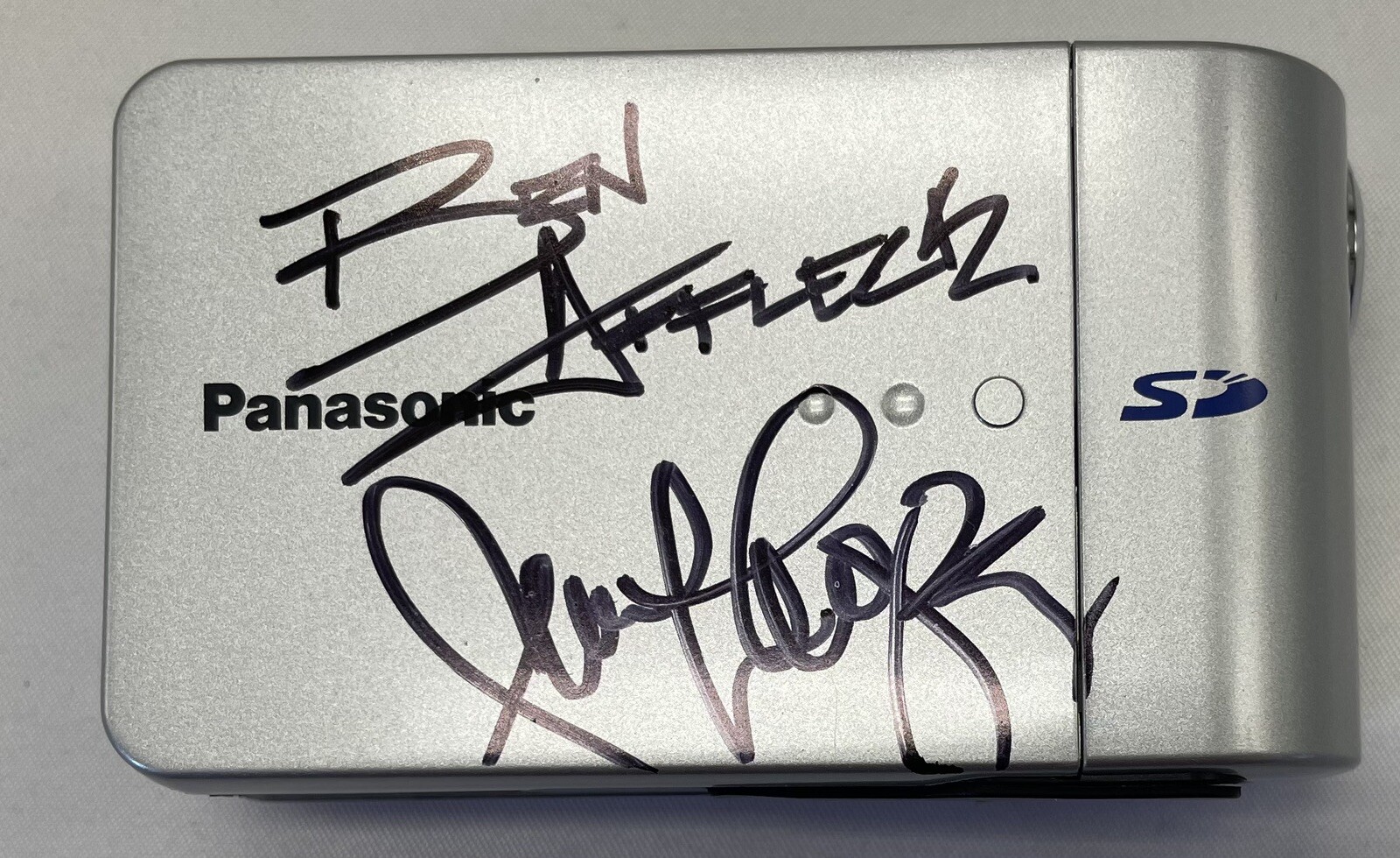 Panasonic Mini Camcorder Signed by Ben Affleck + Jennifer Lopez + JSA (AI98843)