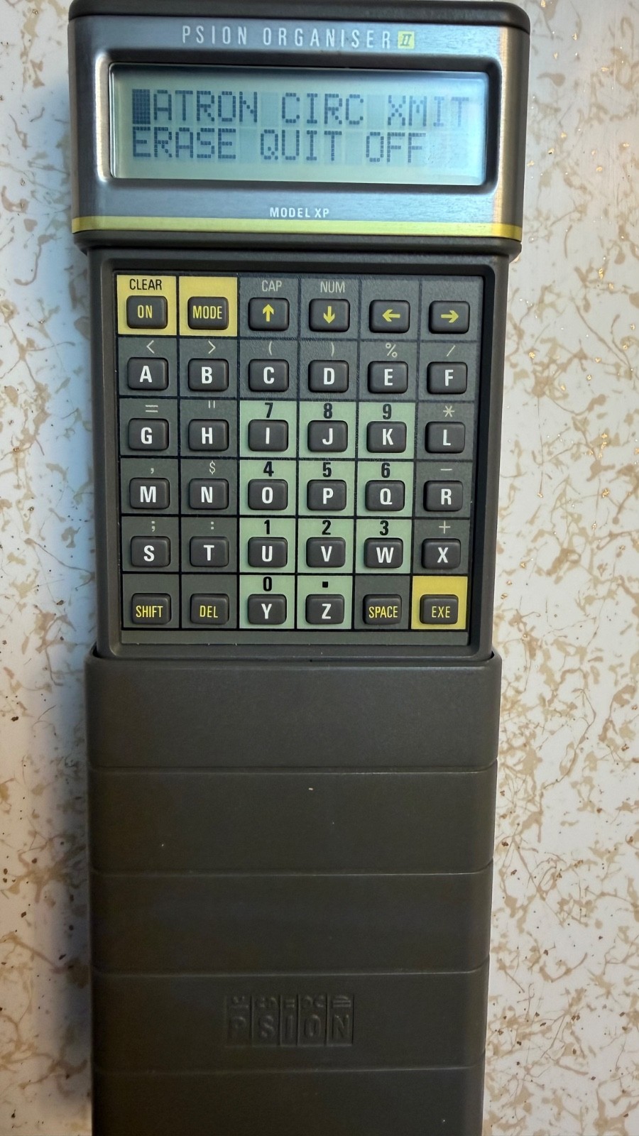 Psion Organiser II with powered comms link cable/charger 8K data pack