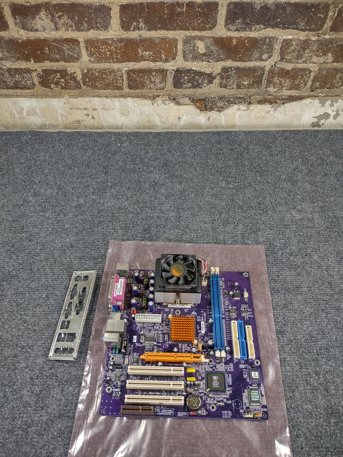 ECS 741GX-M WITH AMD SEMPRON 2400, CPU COOLER AND I/O PLATE !!!!!