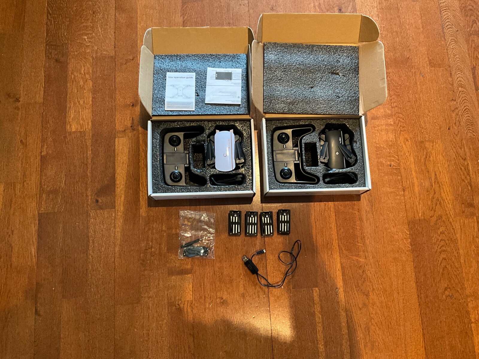2 Drones Parts only 4 batteries 1 charger Falcon Collapsible 2.4GHZ Parts Only