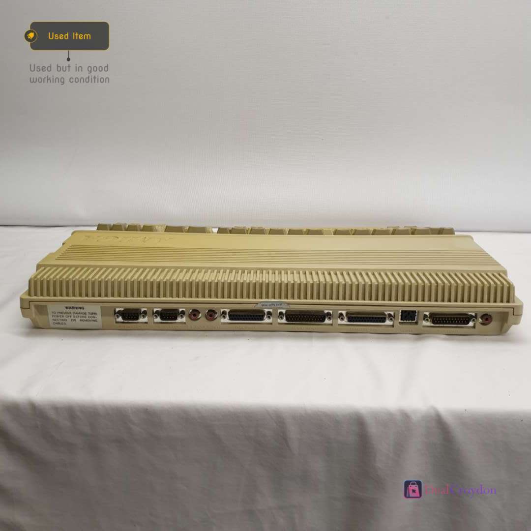 COMMODORE AMIGA A500 COMPUTER +COMMODORE A520 +MOUSE + 10 DISKS + POWER SUPPLY