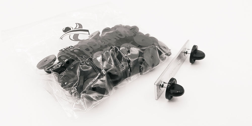 Wholesale Lot "100" RUBBER PIN BACKS