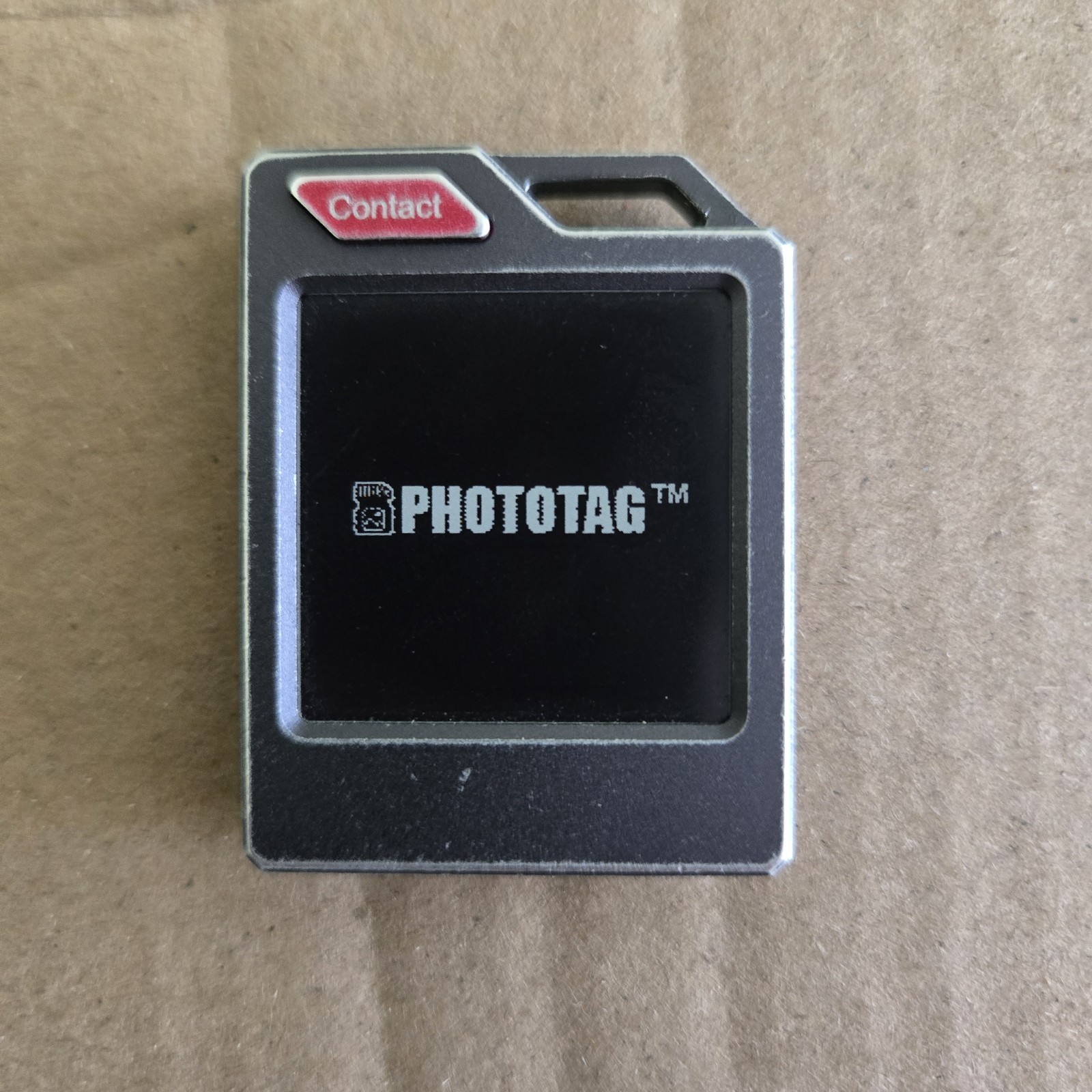 PhotoTag  (Gray) works with Apple & Android used