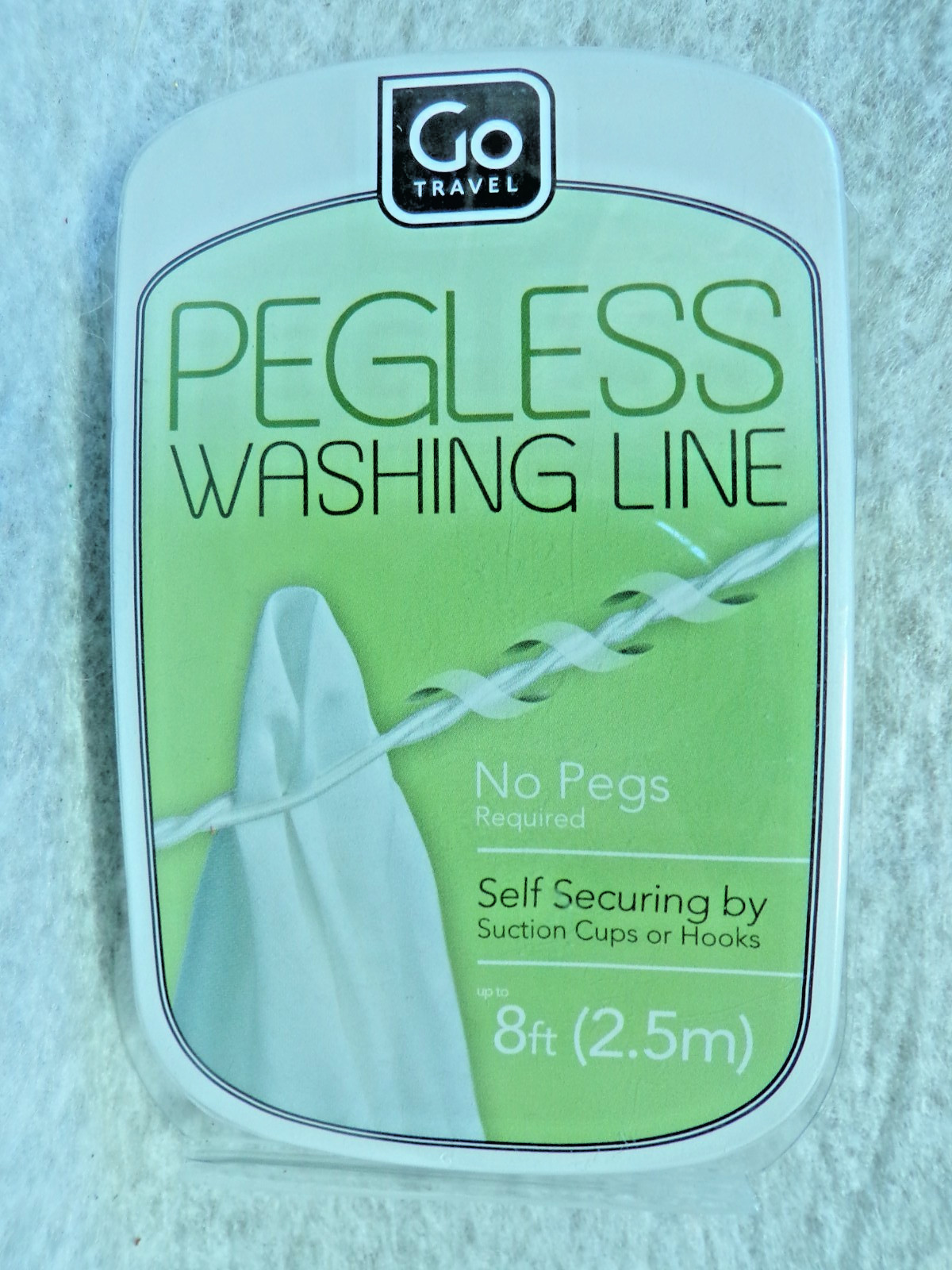 GO TRAVEL PEGLESS 8' WASHING LINE NO CLOTHES PINS REQUIRED SELF SECURING HOOKS