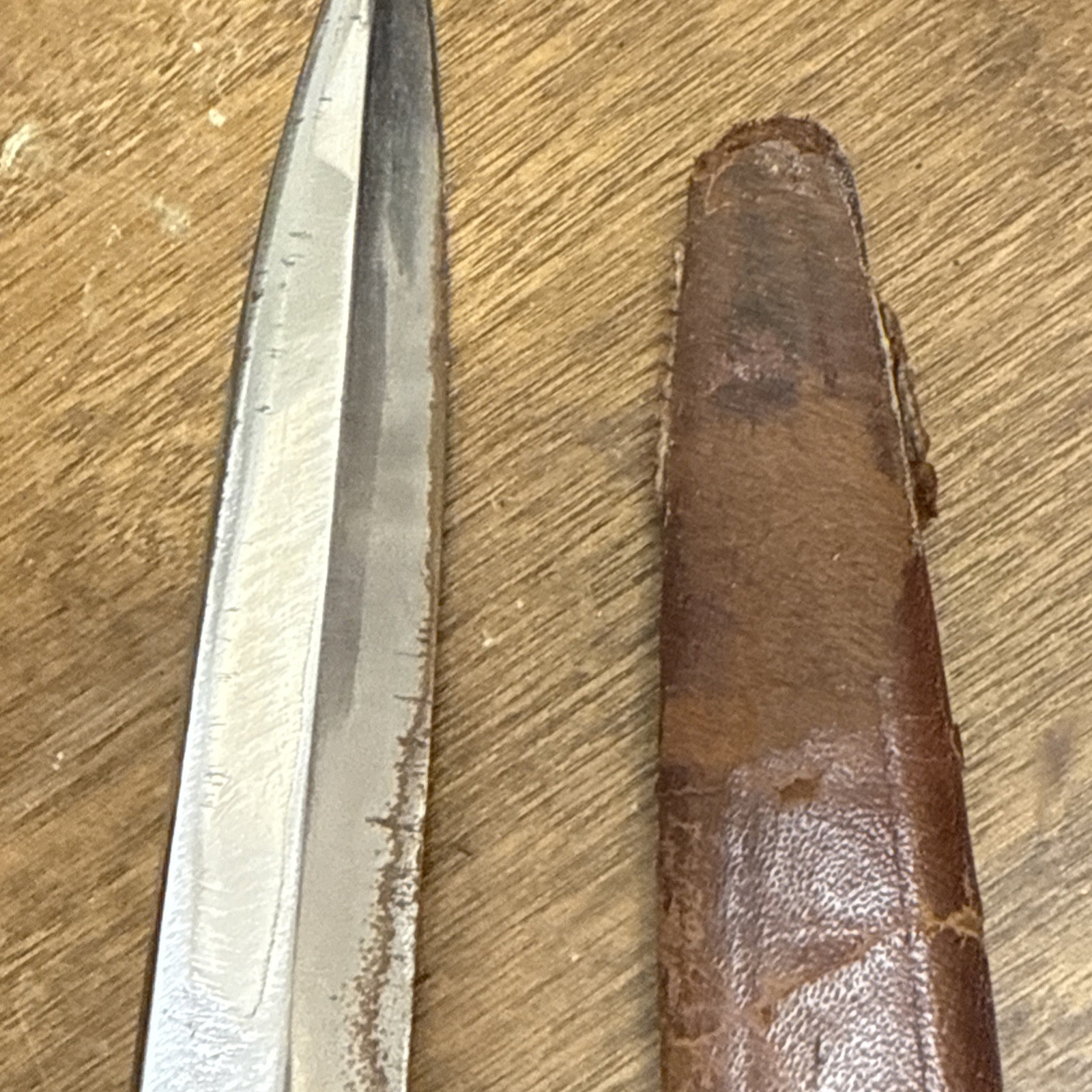 A GERMAN SOLINGEN DAGGER WITH ENGRAVED BLADE