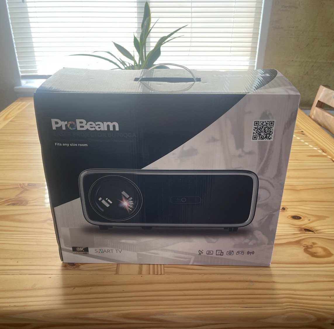 ProBeam BU70QGA  8k laser projector and BrightEra 8k motorized screen