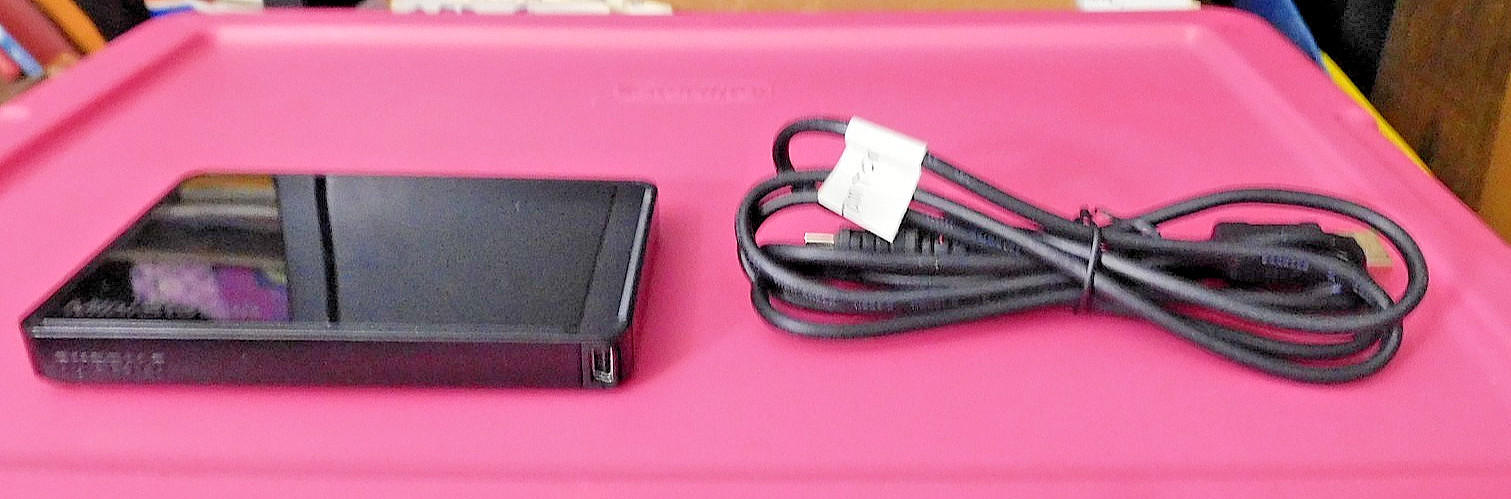Tom Tom GPS (includes Buffalo MiniStation, USB Cord, and Universal Adapters)