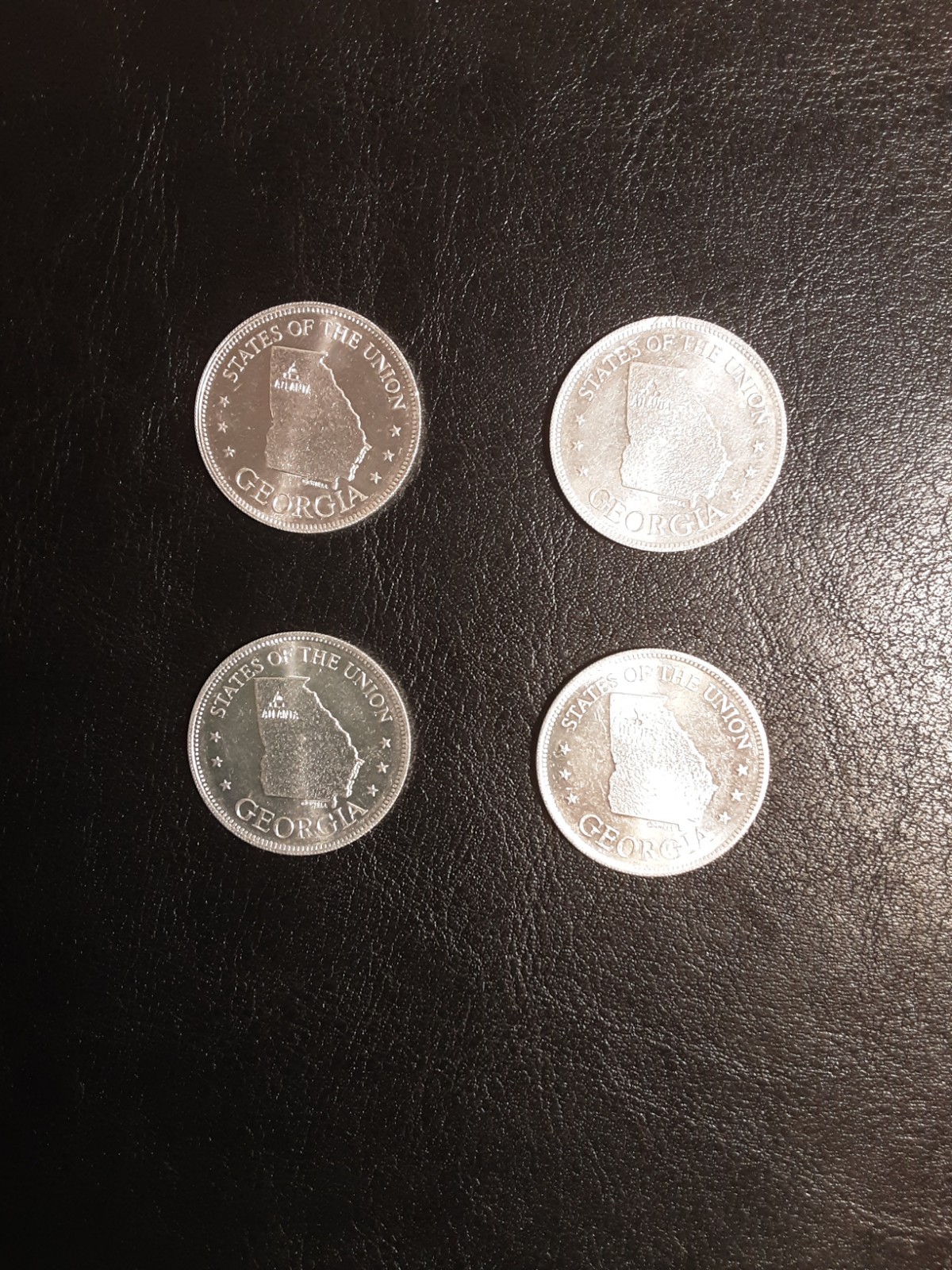 Georgia Shell's coin game / Lot of 4