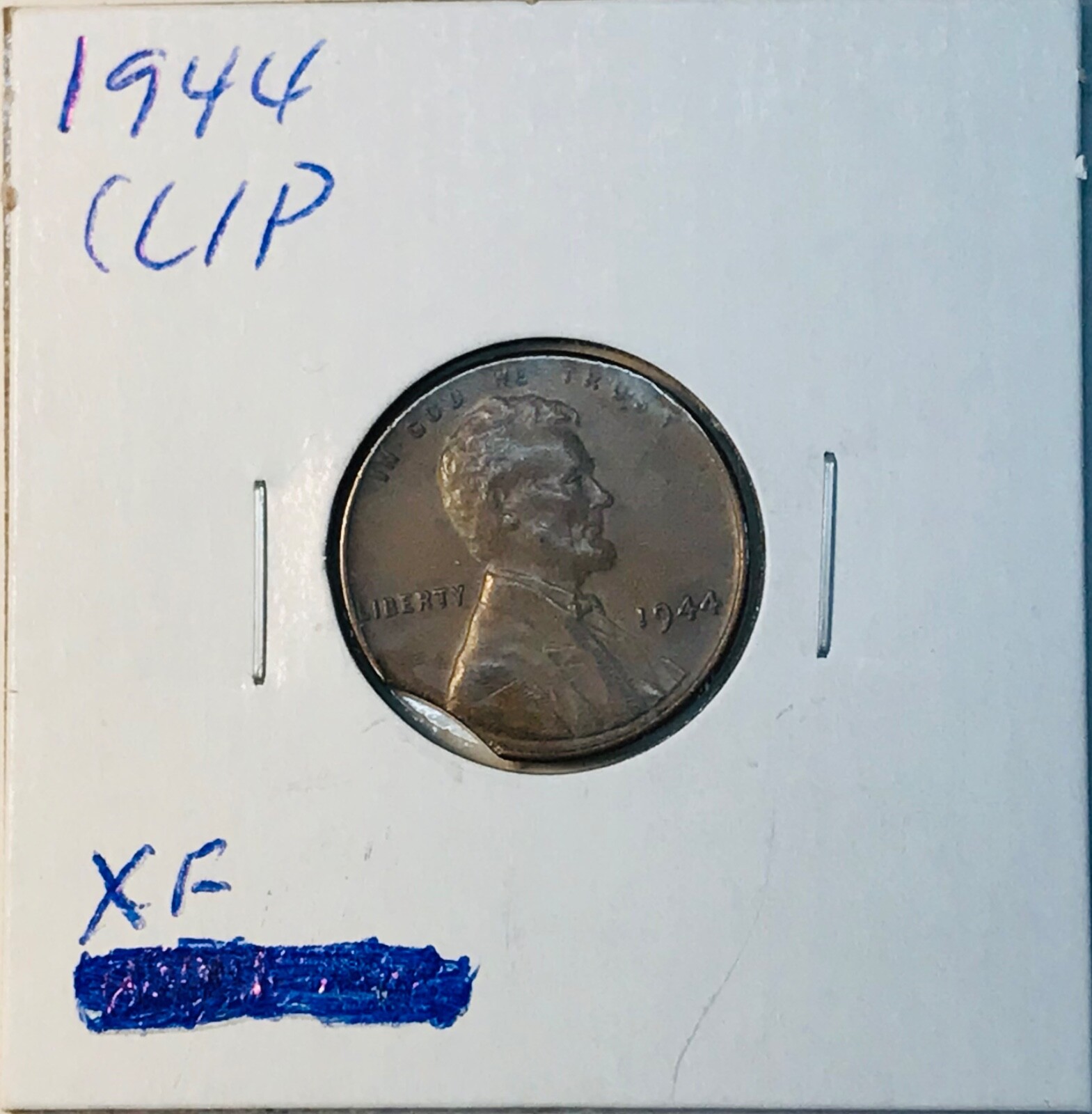 1944 Lincoln Wheat cent with curved clip