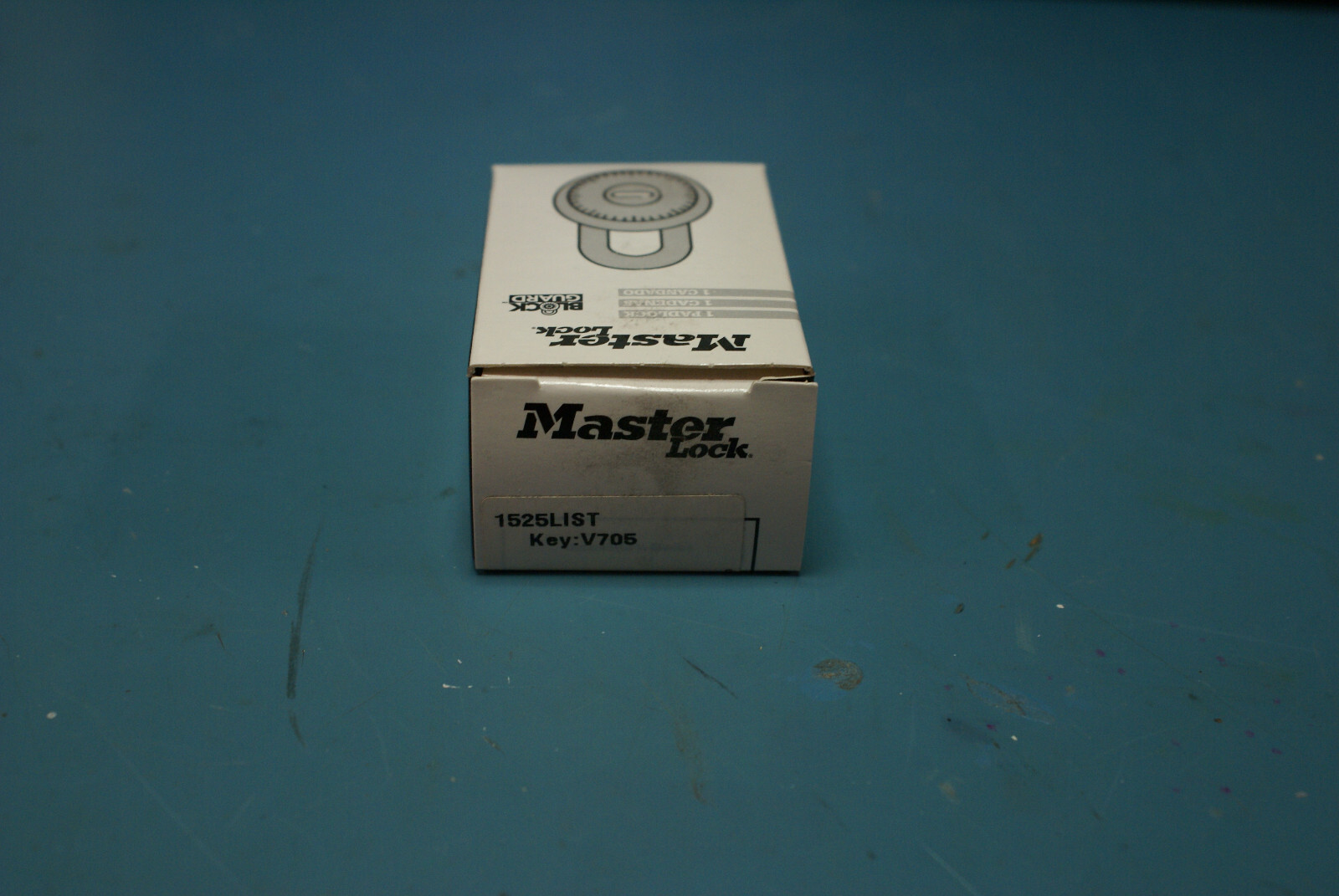 Master Lock 1525 Preset Combination Padlock, Black Dial V705 Key