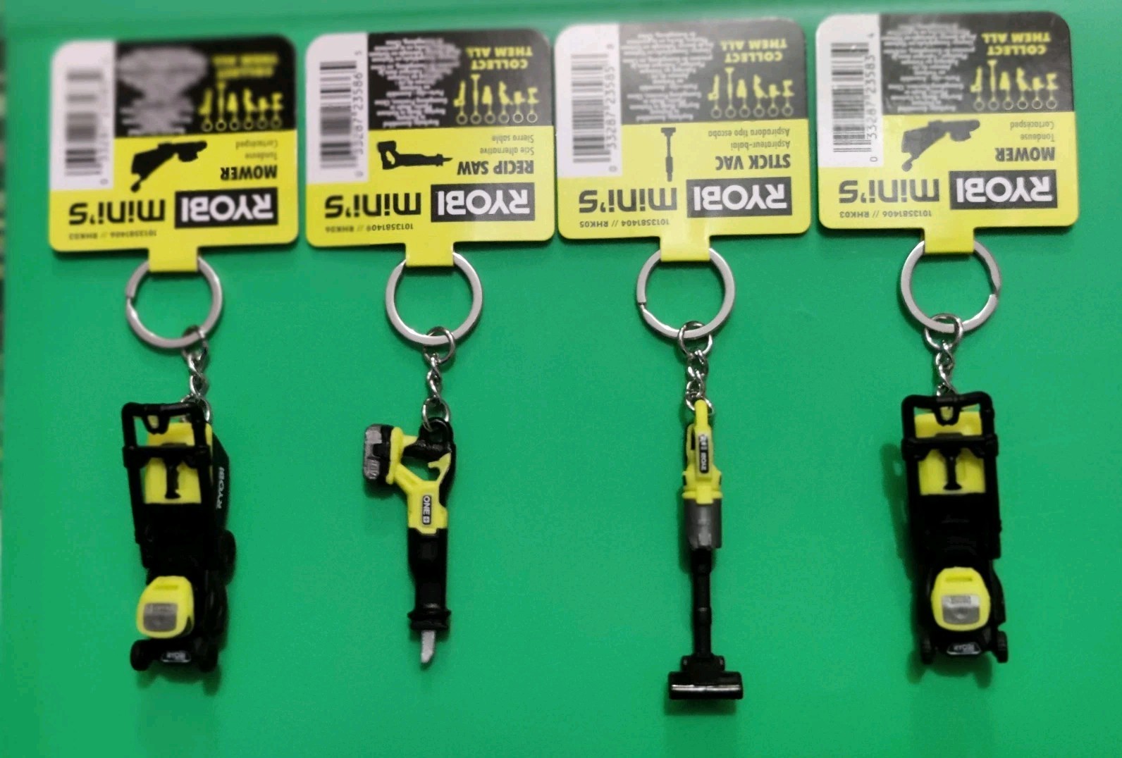 Ryobi Mini's 4 Piece Keychain Set Recip Saw, Stick Vac  and 2 Lawn Mow