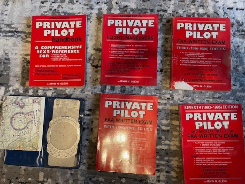 Private Pilot handbook set by Irvin N. Gleim with "AN INVITATION TO FLY" manual