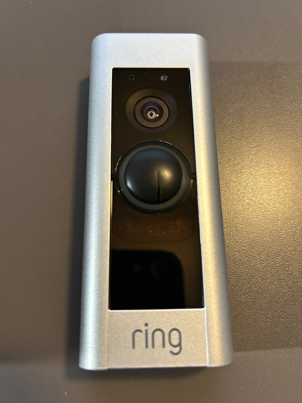 Ring video doorbell pro hardwired with a crack in button and functions as normal