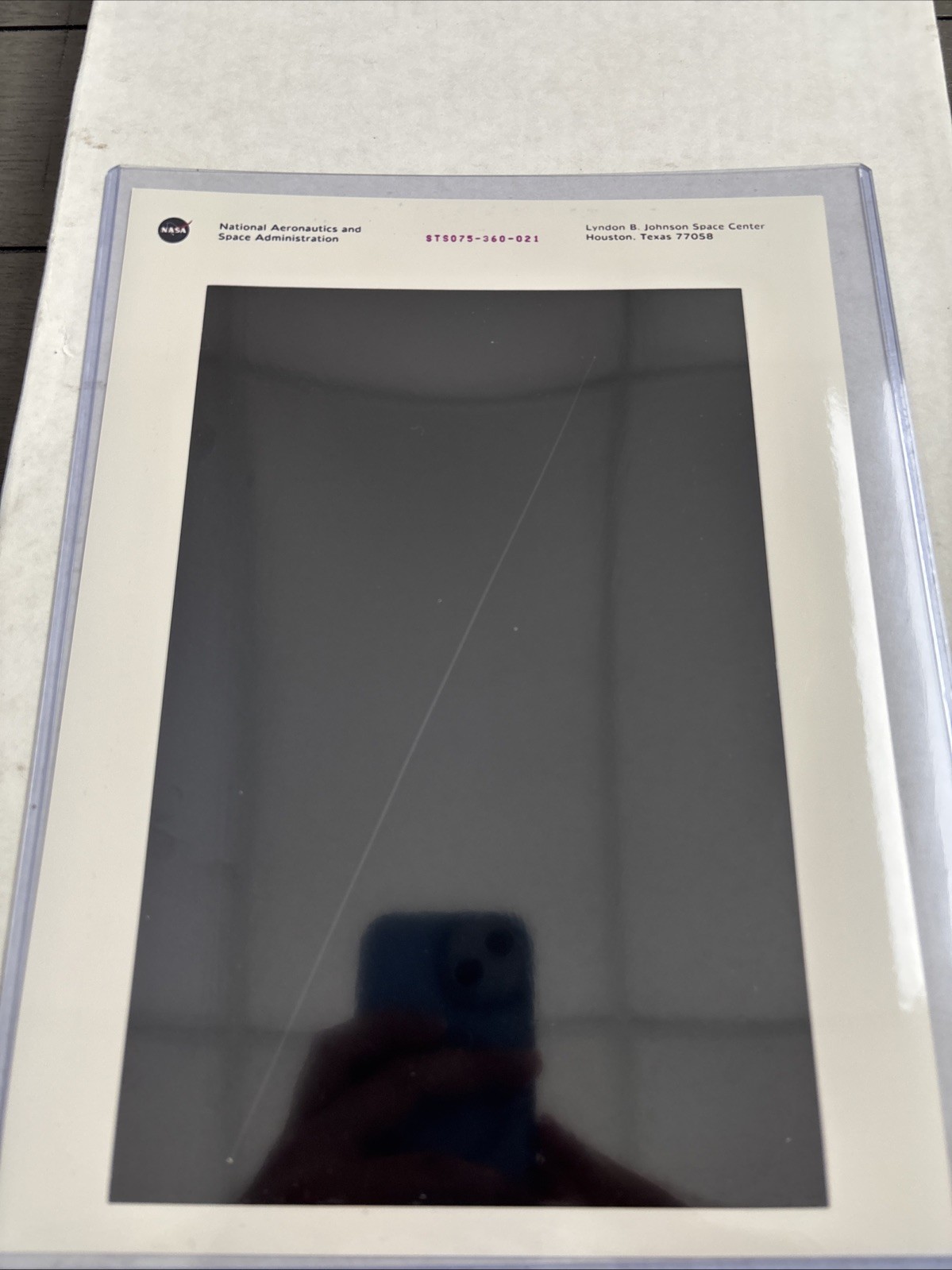 NASA STS-75 Columbia TSS Loose Tether Purple Numbered Press Photo