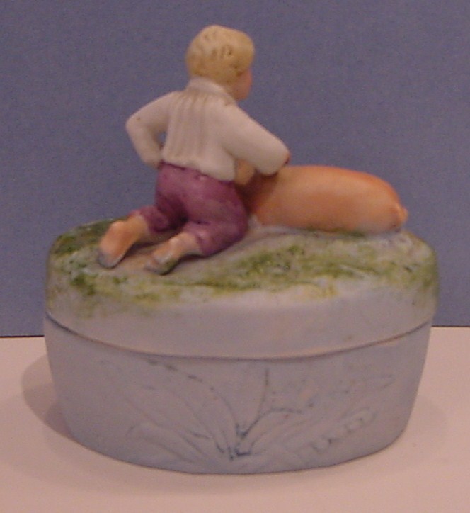 Porcelain Boy with Pig Trinket Box
