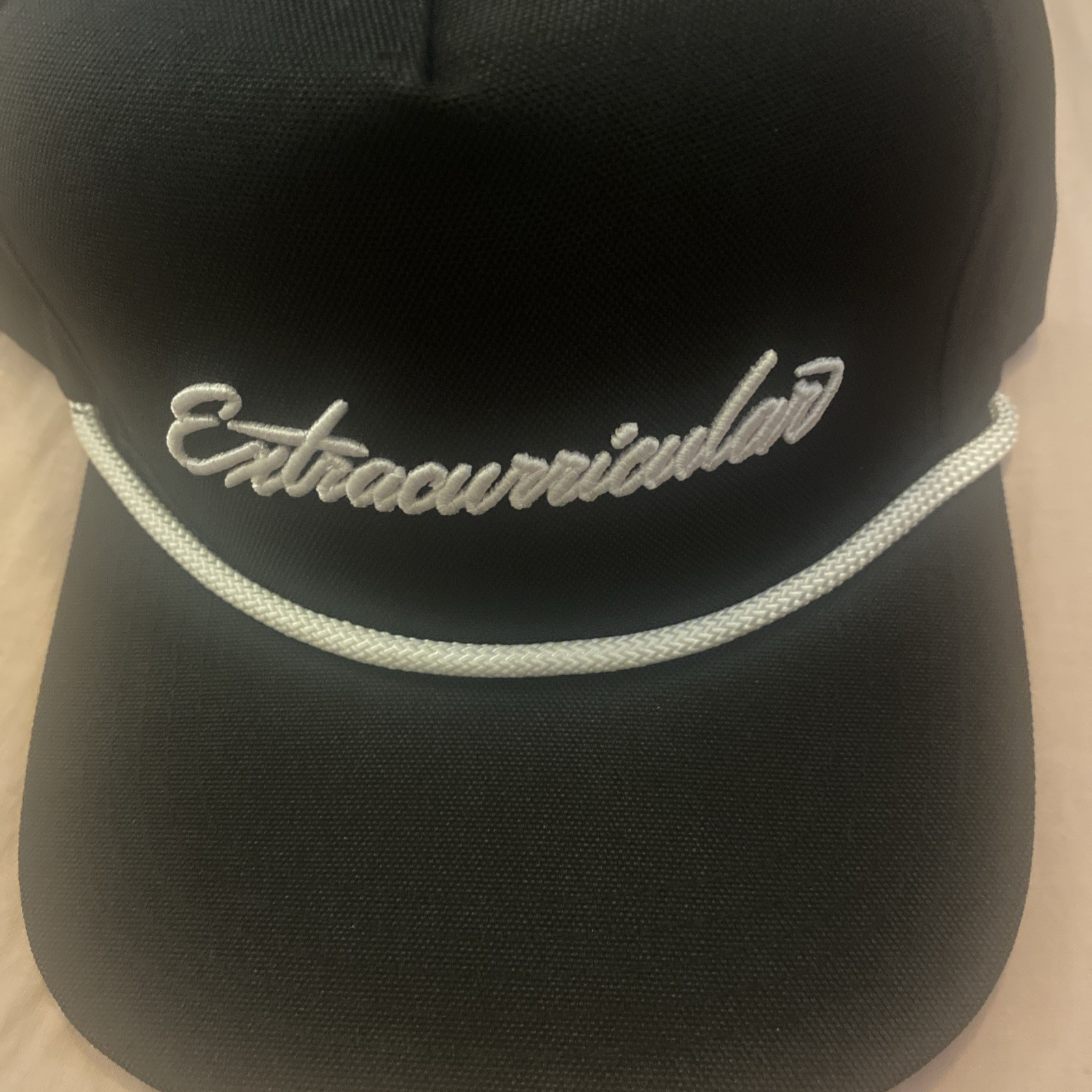 Extracurricular Golf Flexfit SnapBack Hat embroidered logo black