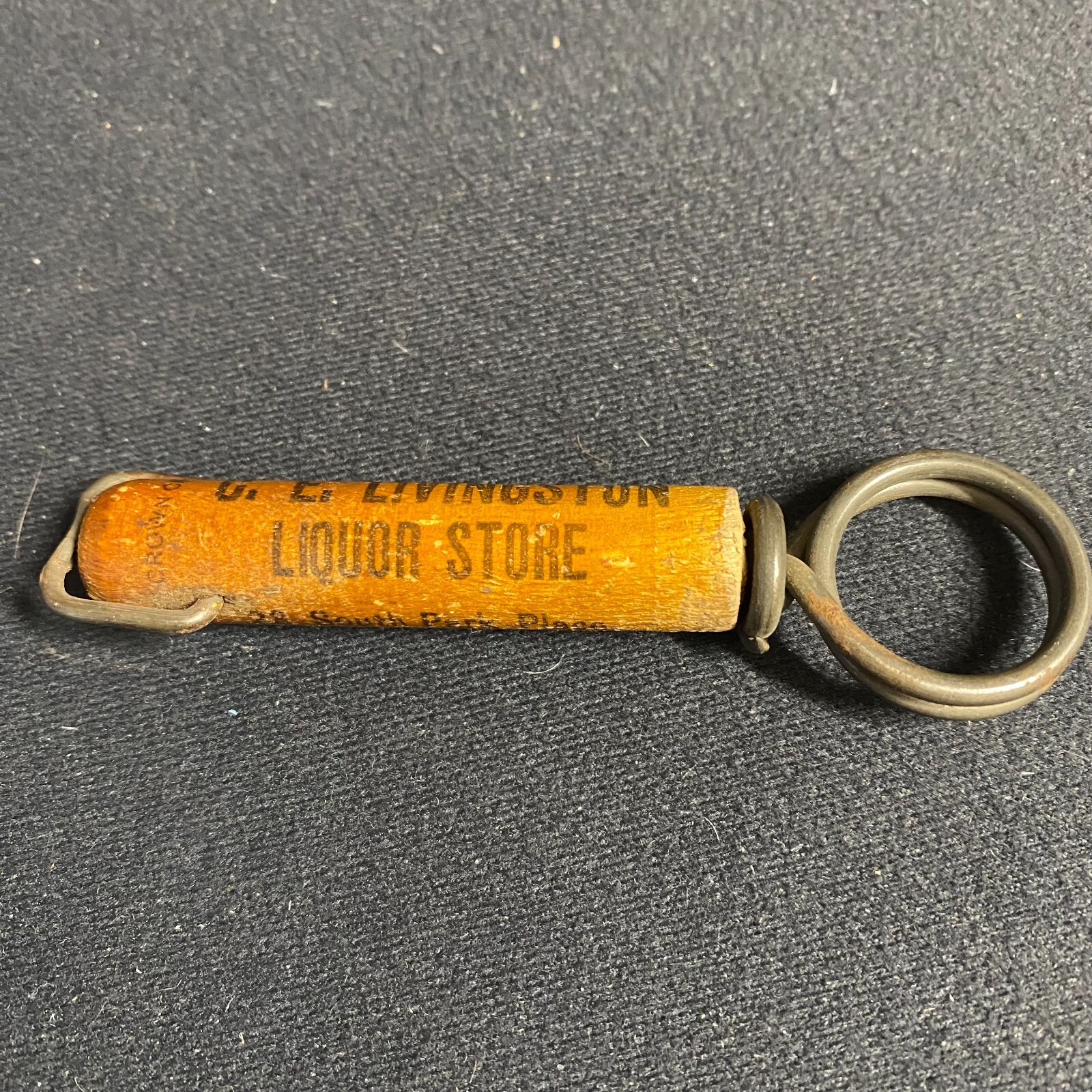 Newark, OH G.E. Livingston Liquor Store Wire Lift Crown Cap Bottle Opener