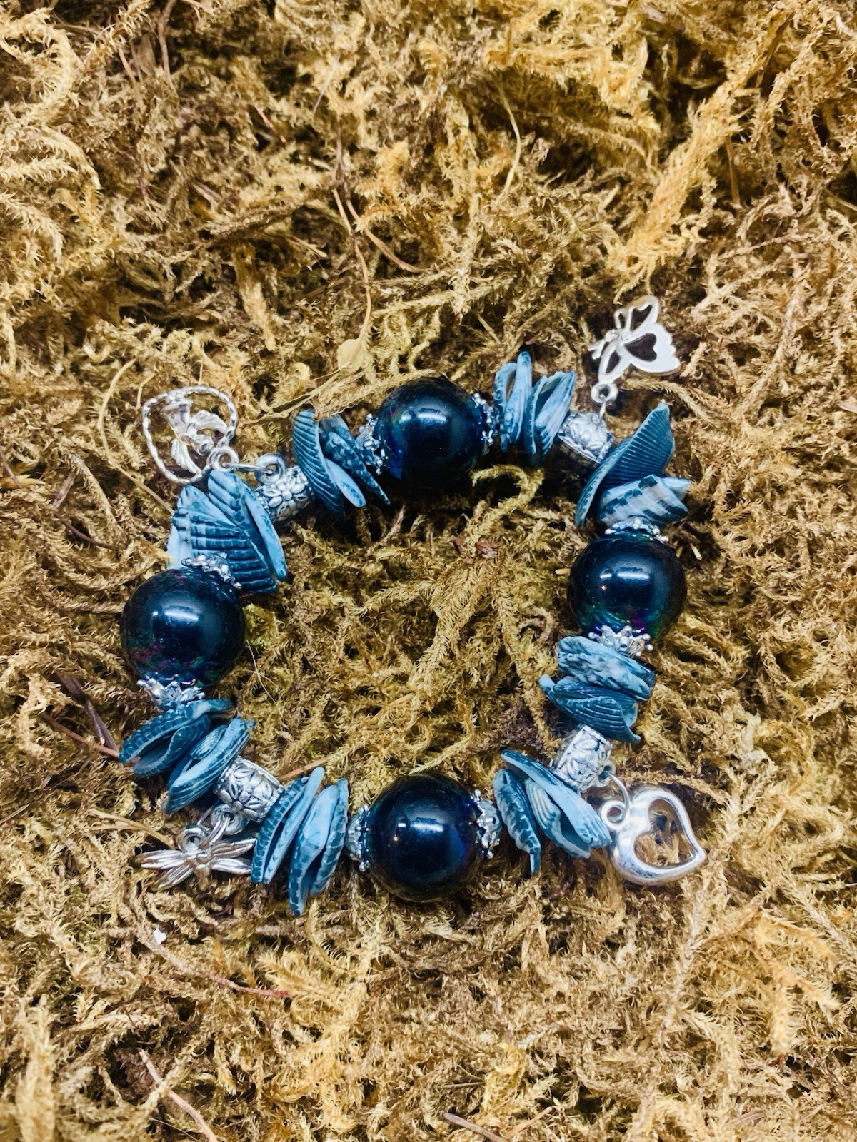 Handcrafted stretchy beaded shell charm bracelet