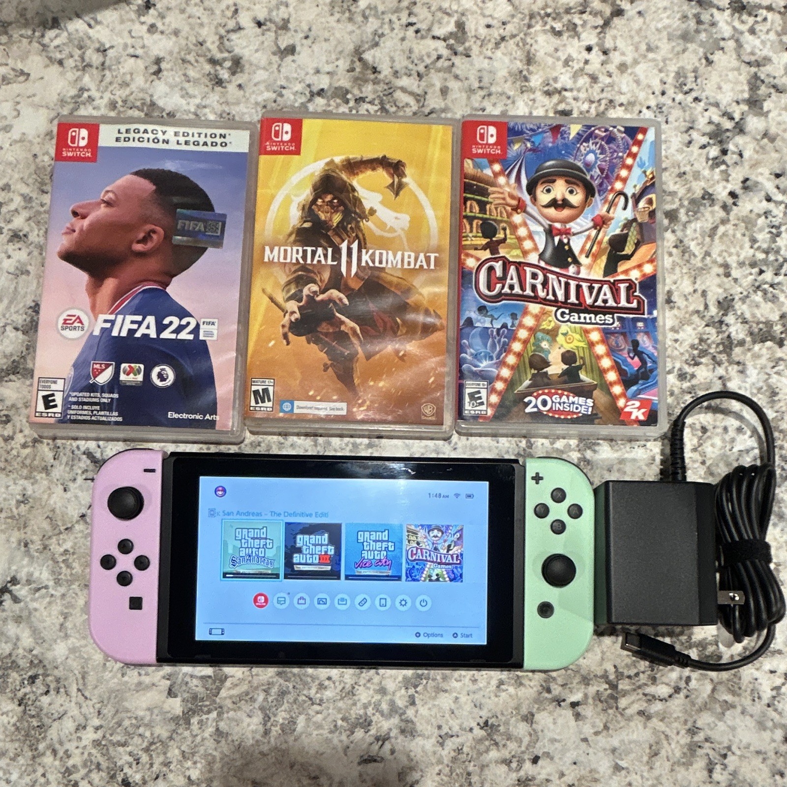 Nintendo Switch Bundle w/ Joy-Cons, Power Adapter, FIFA 22, MK11, carnival games